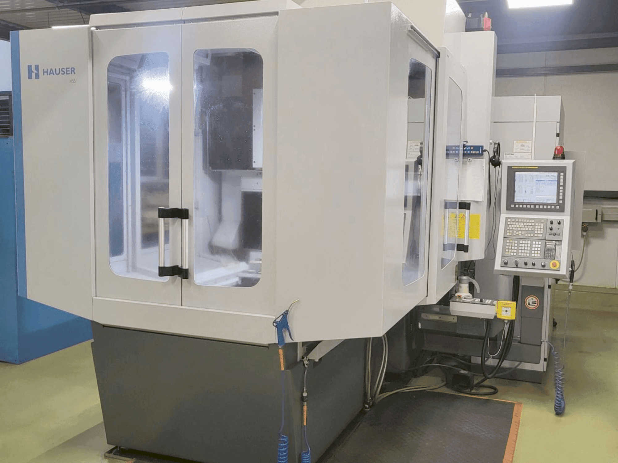 Prikaz  stroja HAUSER KELLENBERGER H55-400  sprijeda