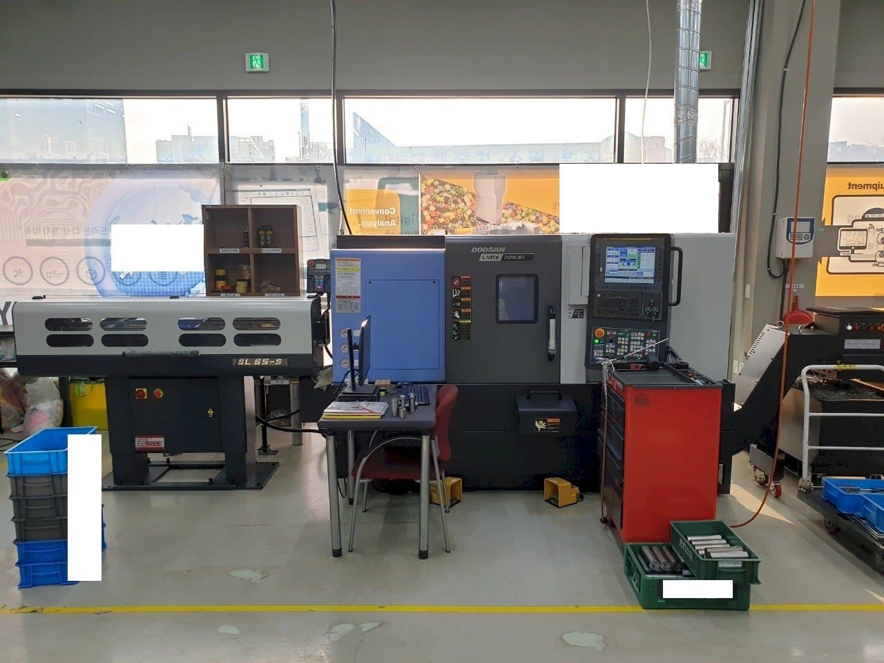 Prikaz stroja Doosan LYNX2100LMSB sprijeda