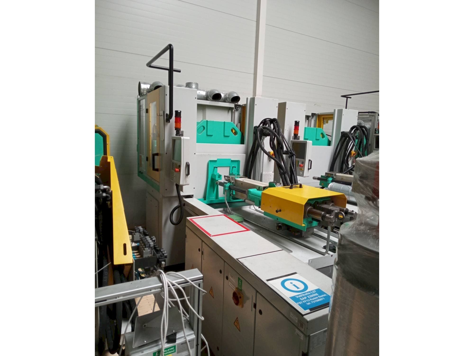 Prikaz stroja Arburg Allrounder 1200T-800-170 sprijeda