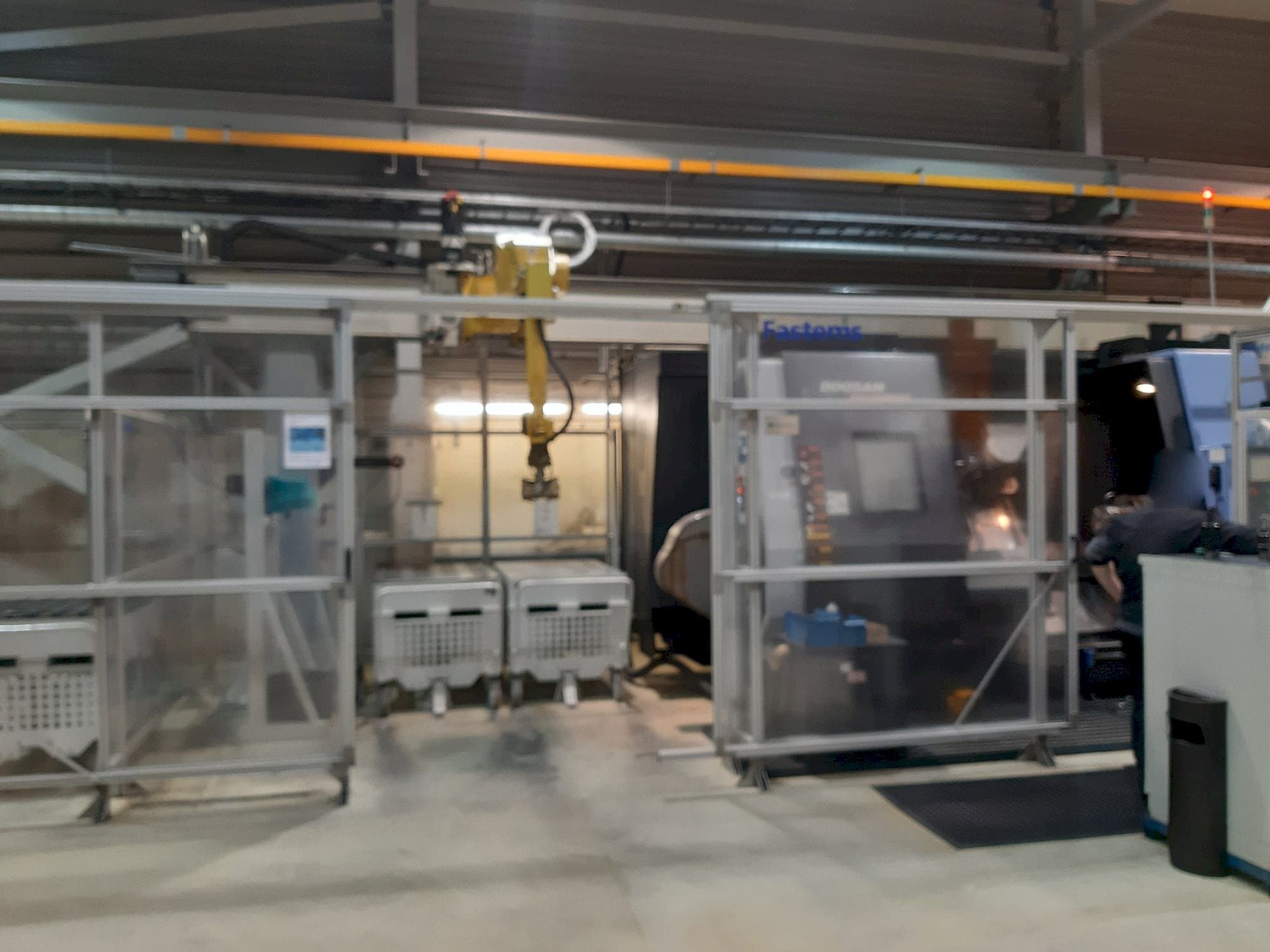 Prikaz  stroja Fastems RPC-70 with Fanuc M-710iC  sprijeda