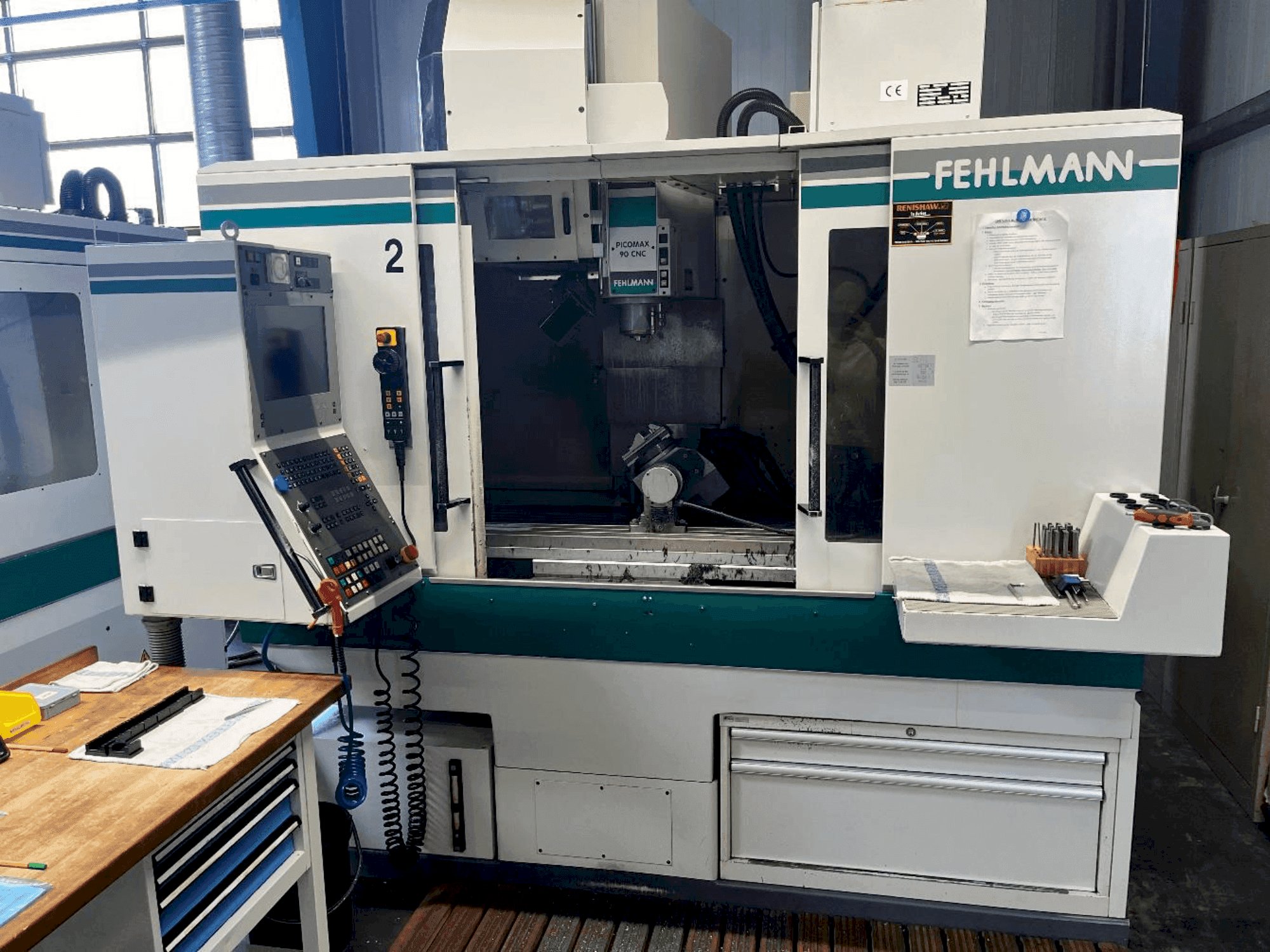 Prikaz  stroja FEHLMANN Picomax 90 CNC  sprijeda