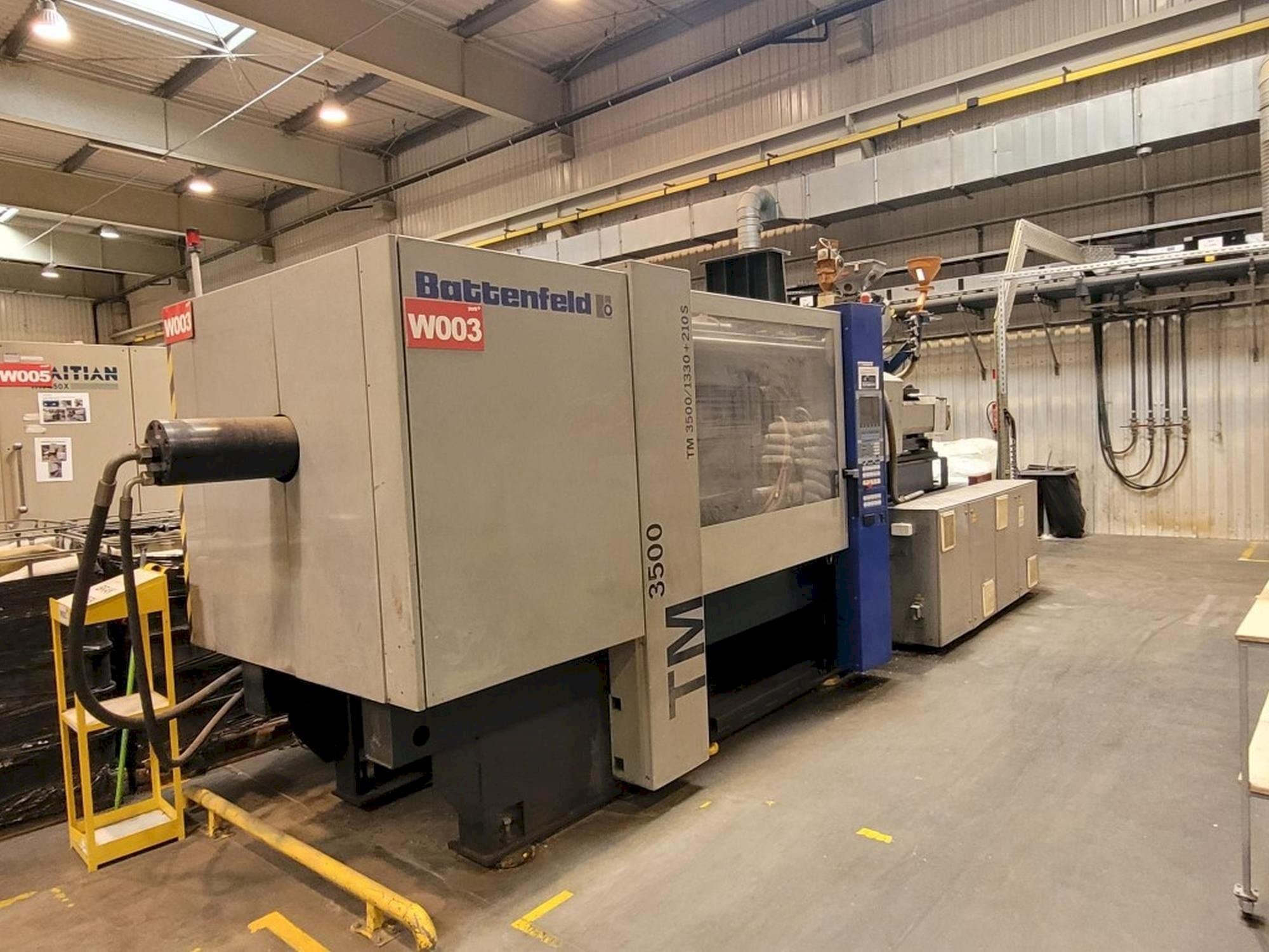 Prikaz stroja Battenfeld TM 3500/1330+210S sprijeda