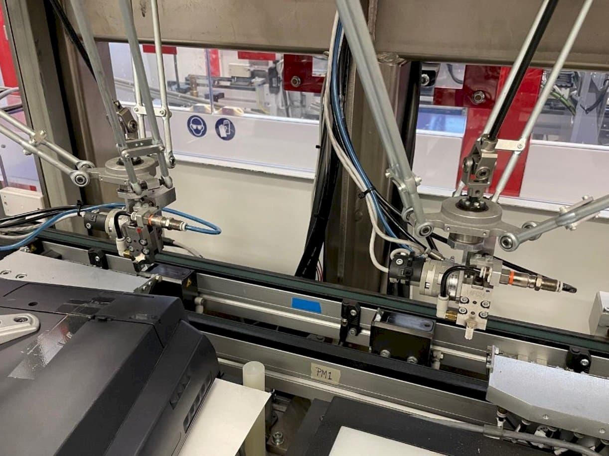 Prikaz stroja IMS Tattoo Assembly Line sprijeda