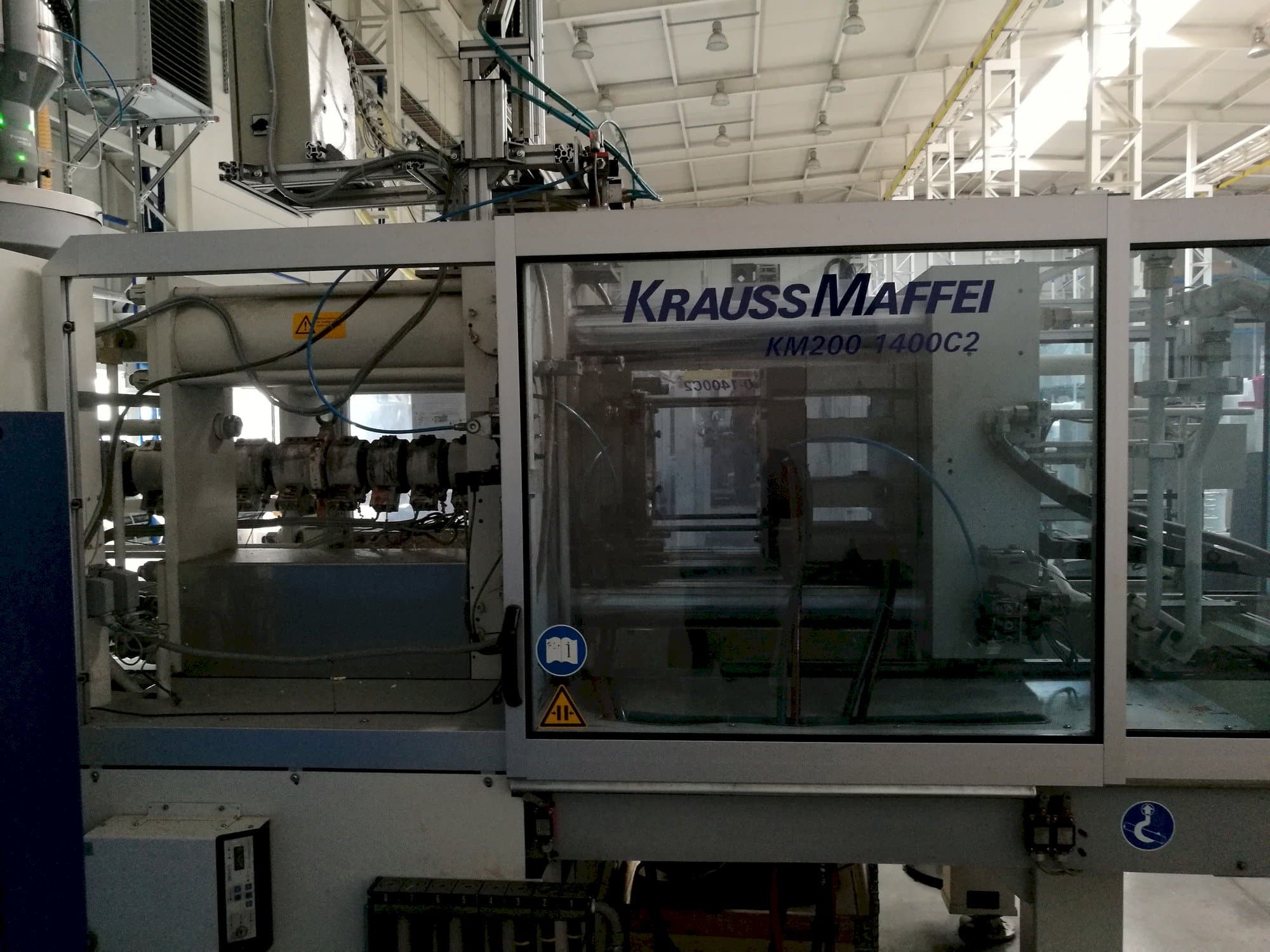 Prikaz  stroja Krauss Maffei 200-1400 C2  sprijeda