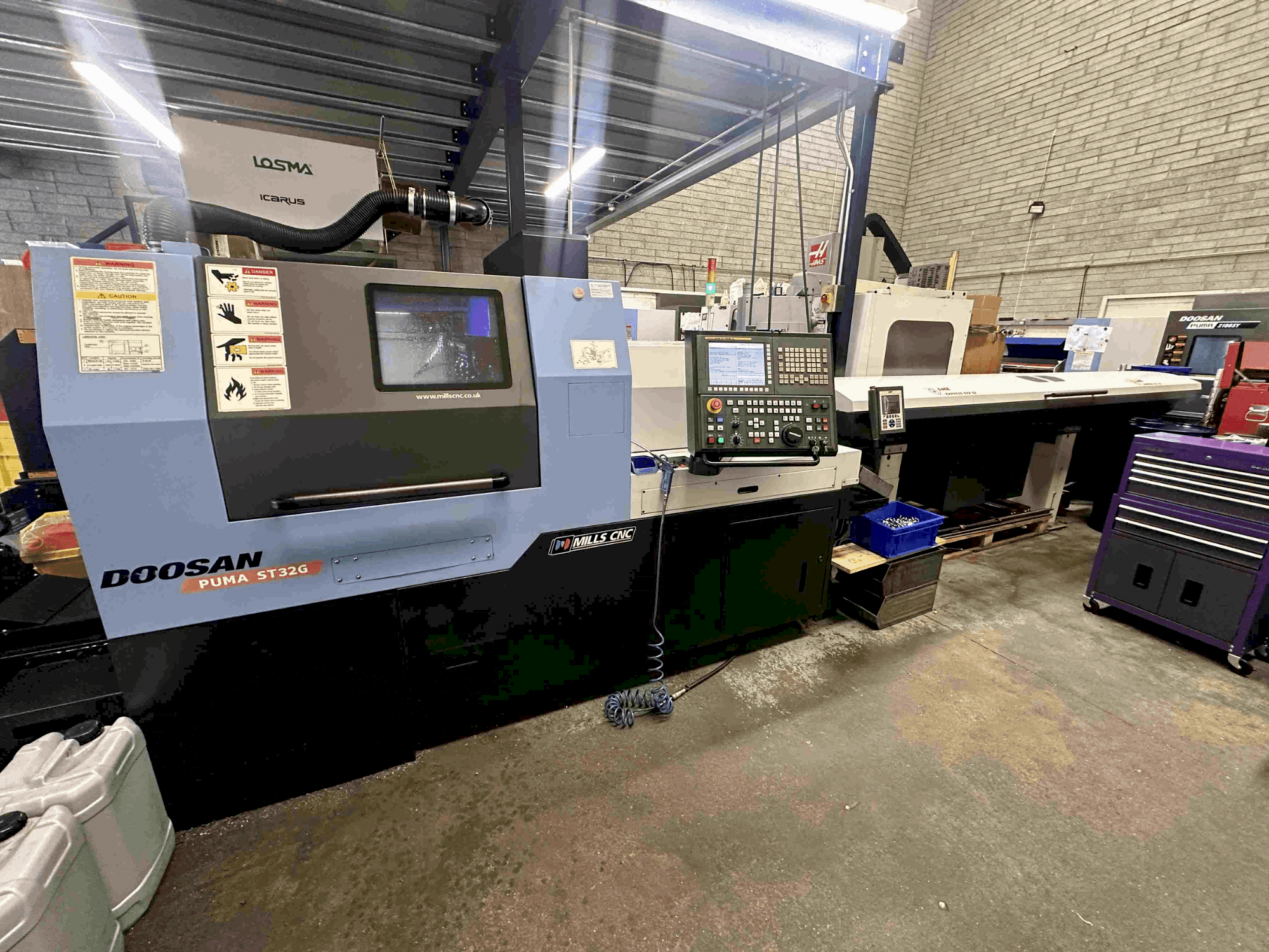 Prikaz  stroja DOOSAN Puma ST32G  sprijeda