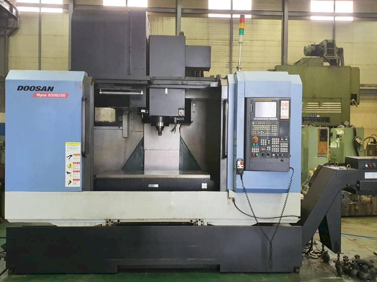 Prikaz stroja Doosan Mynx 6500/50 sprijeda
