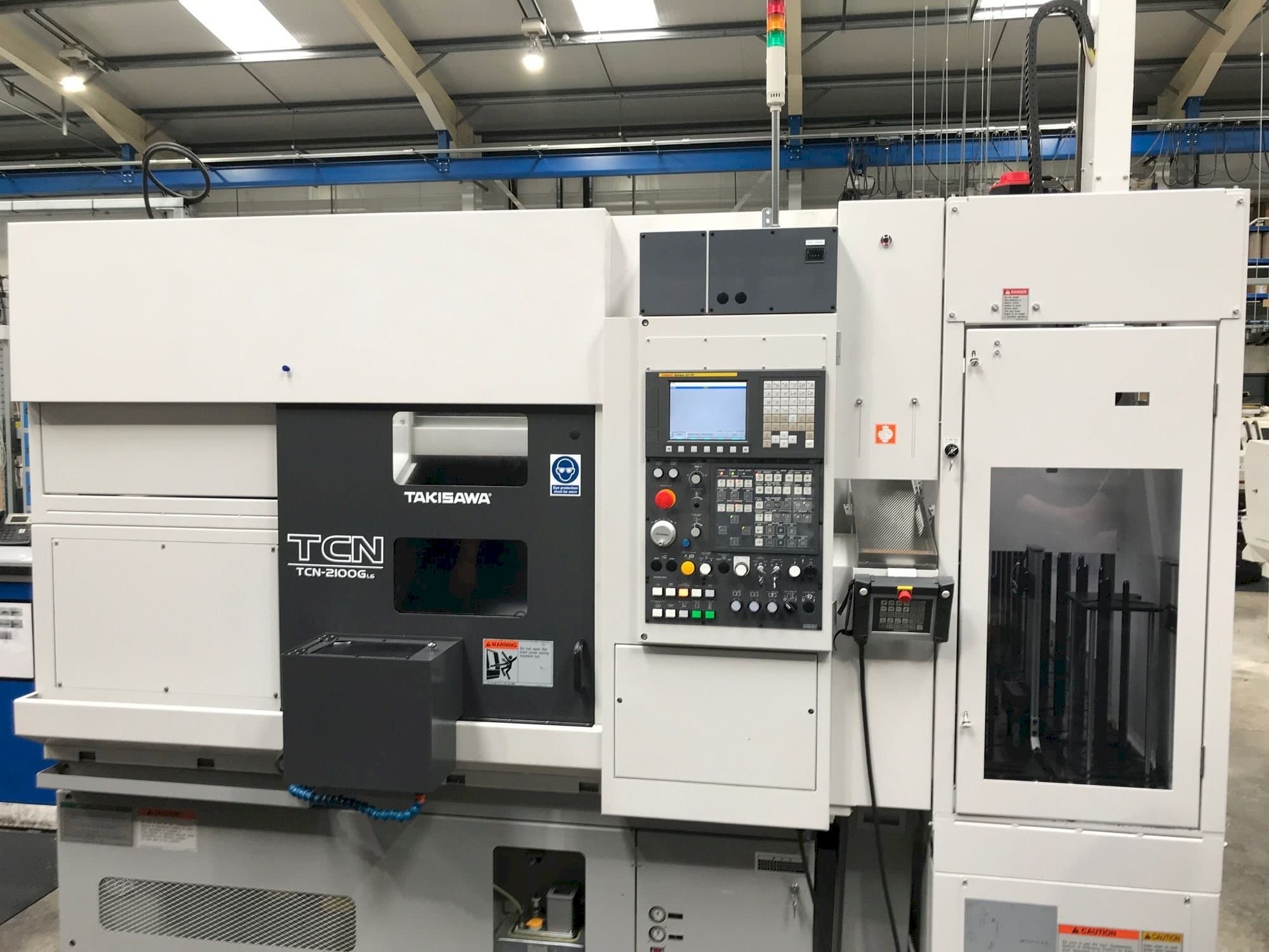 Prikaz stroja Takisawa TCN-2100G L6 sprijeda