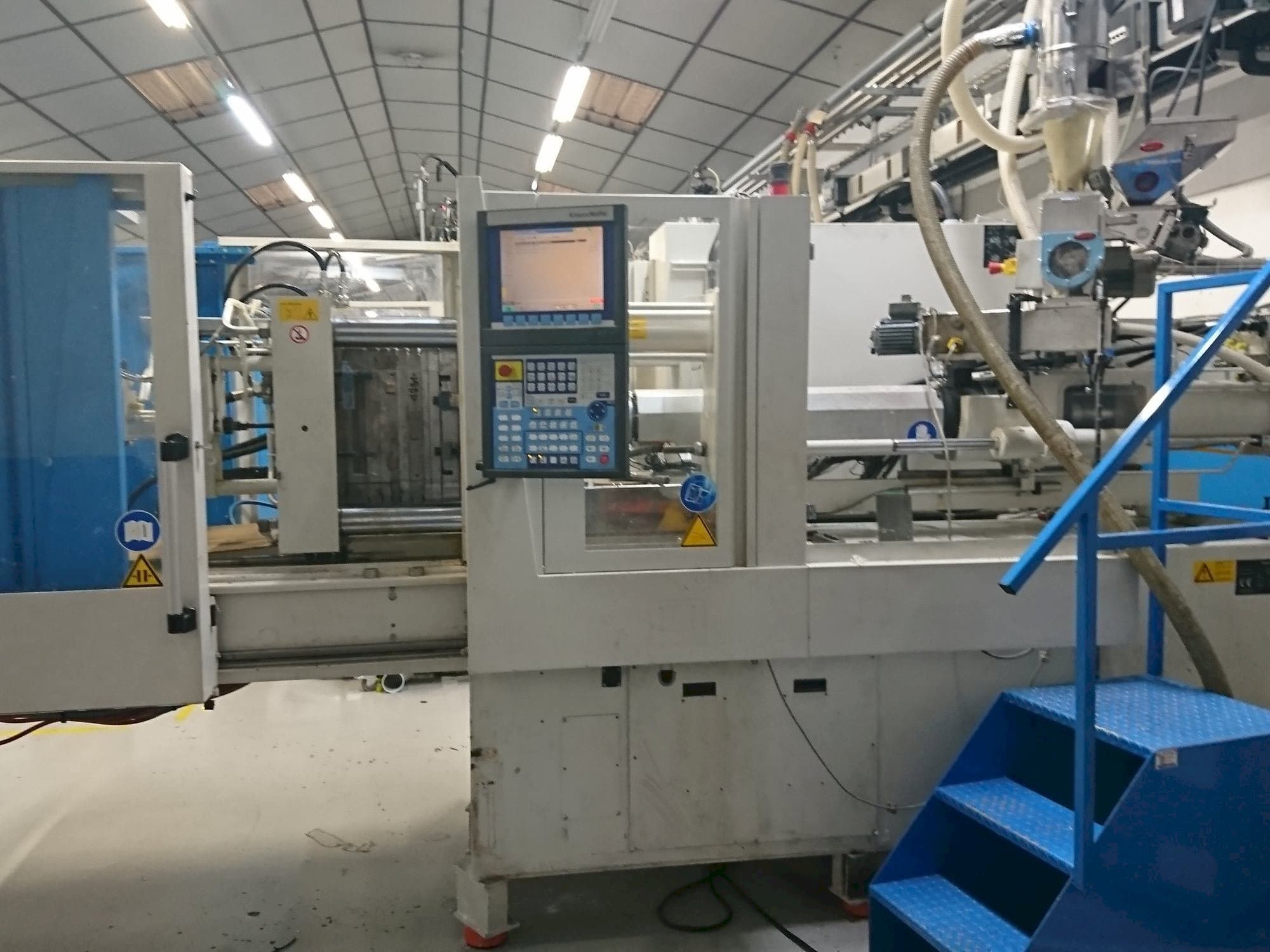 Prikaz  stroja Krauss Maffei 80-750 CX  sprijeda