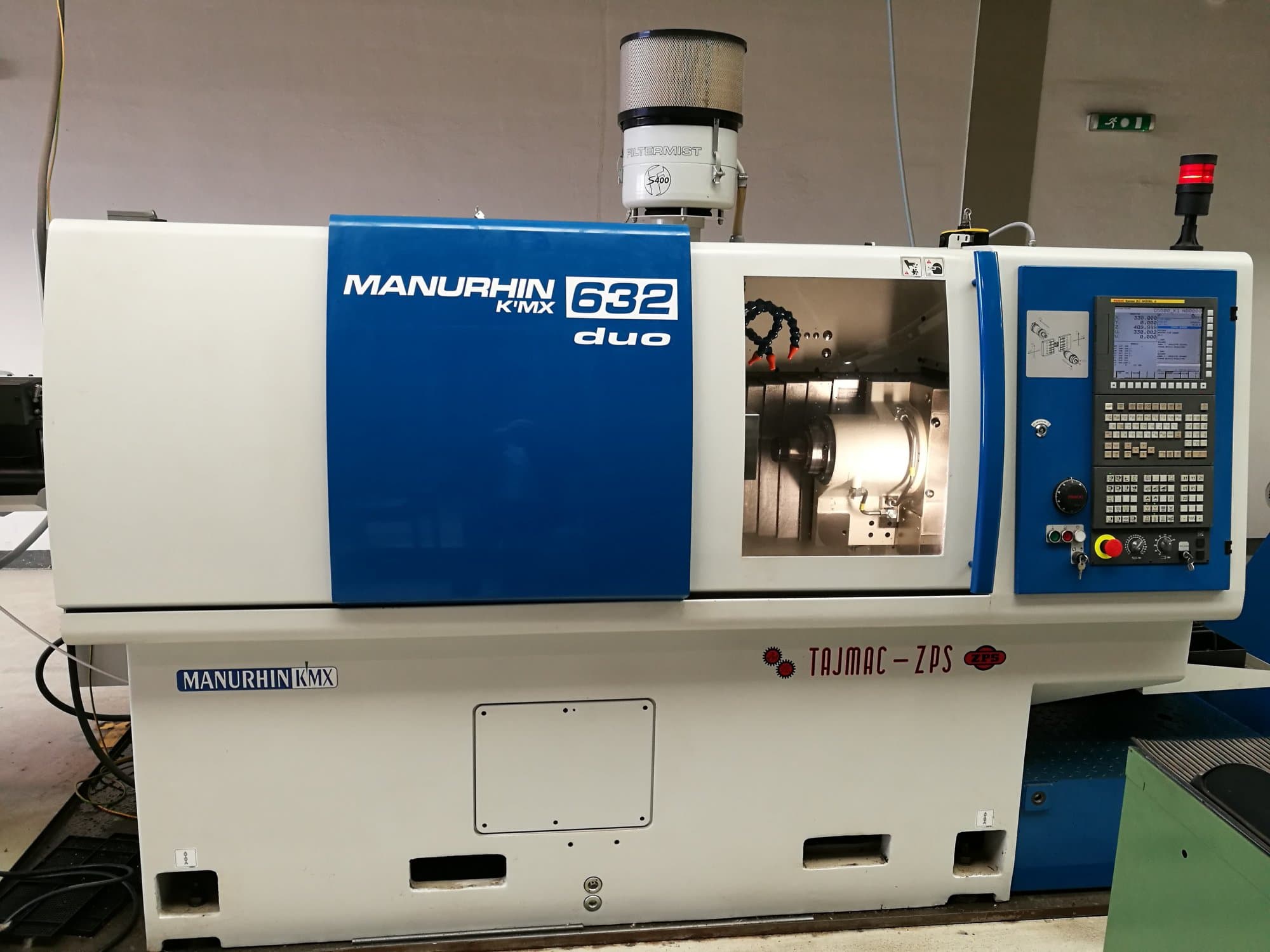 Prikaz stroja TAJMAC-ZPS MANURHIN K'MX 632 DUO sprijeda