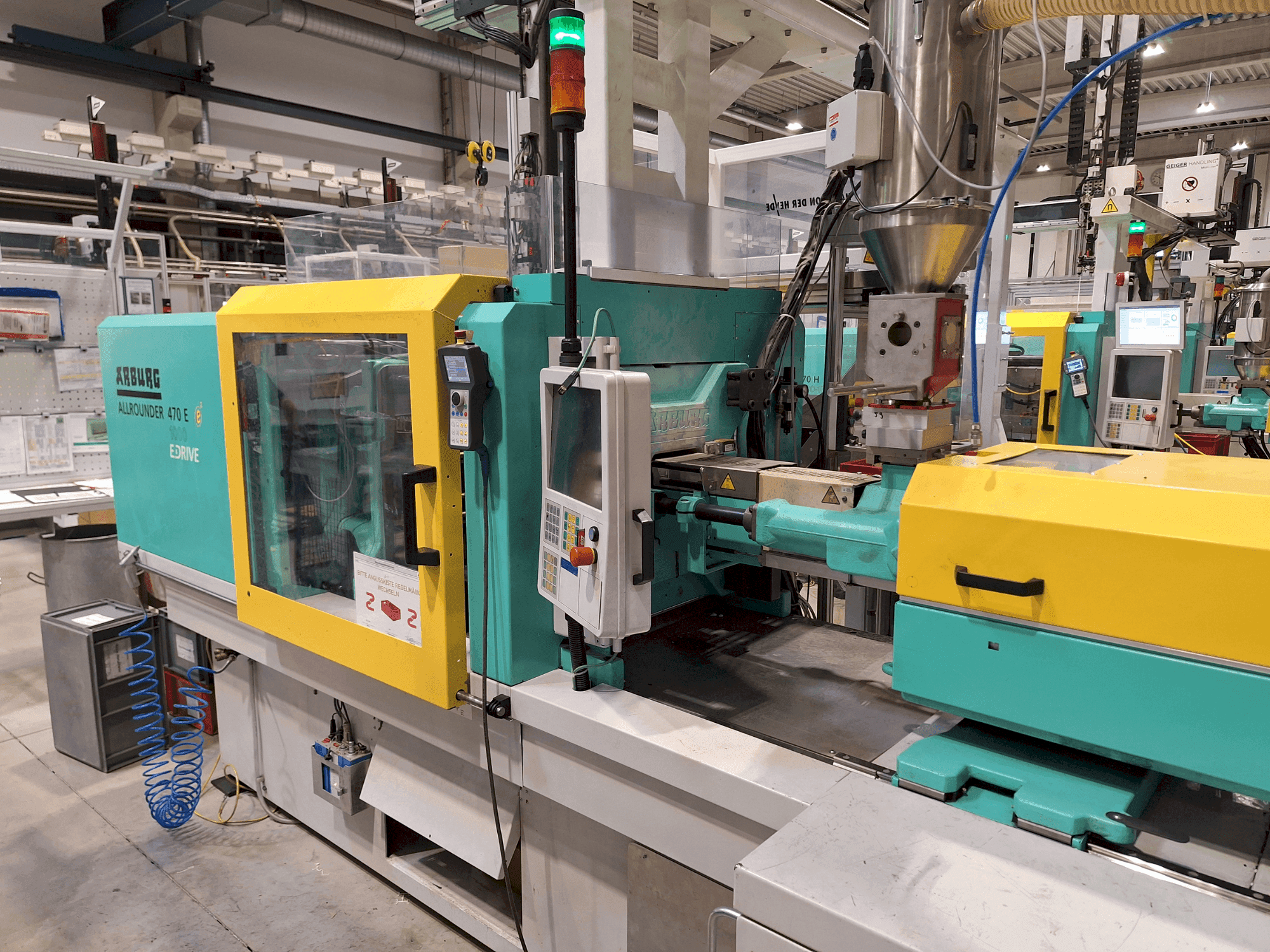 Prikaz stroja Arburg 470 E 1000-700 (2011) sprijeda