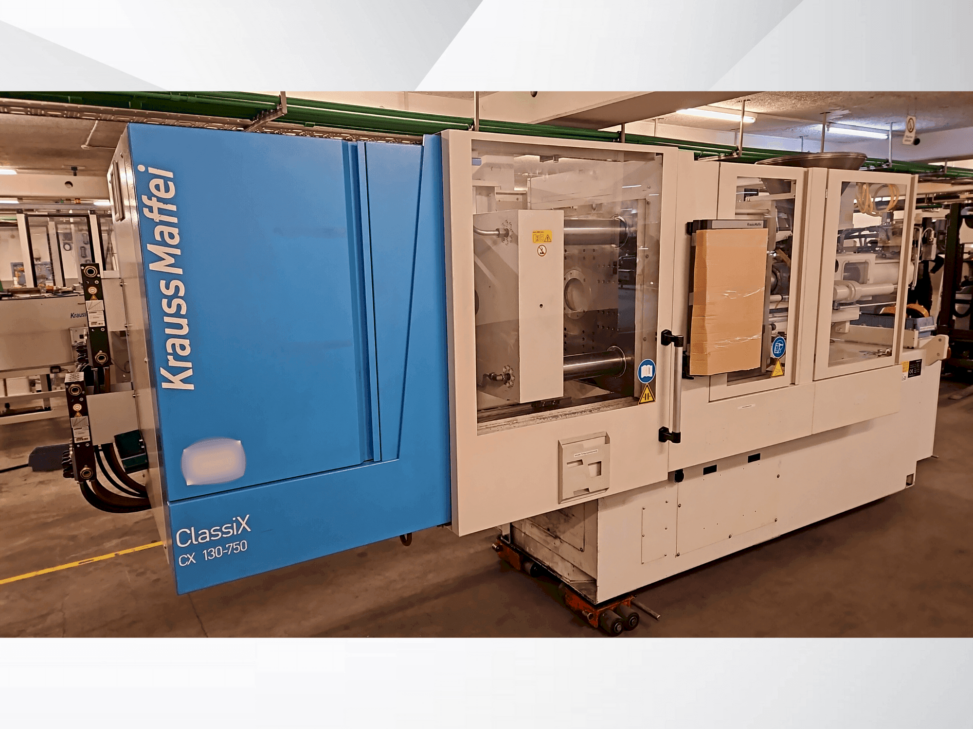 Prikaz stroja Krauss Maffei 130-750 CX sprijeda