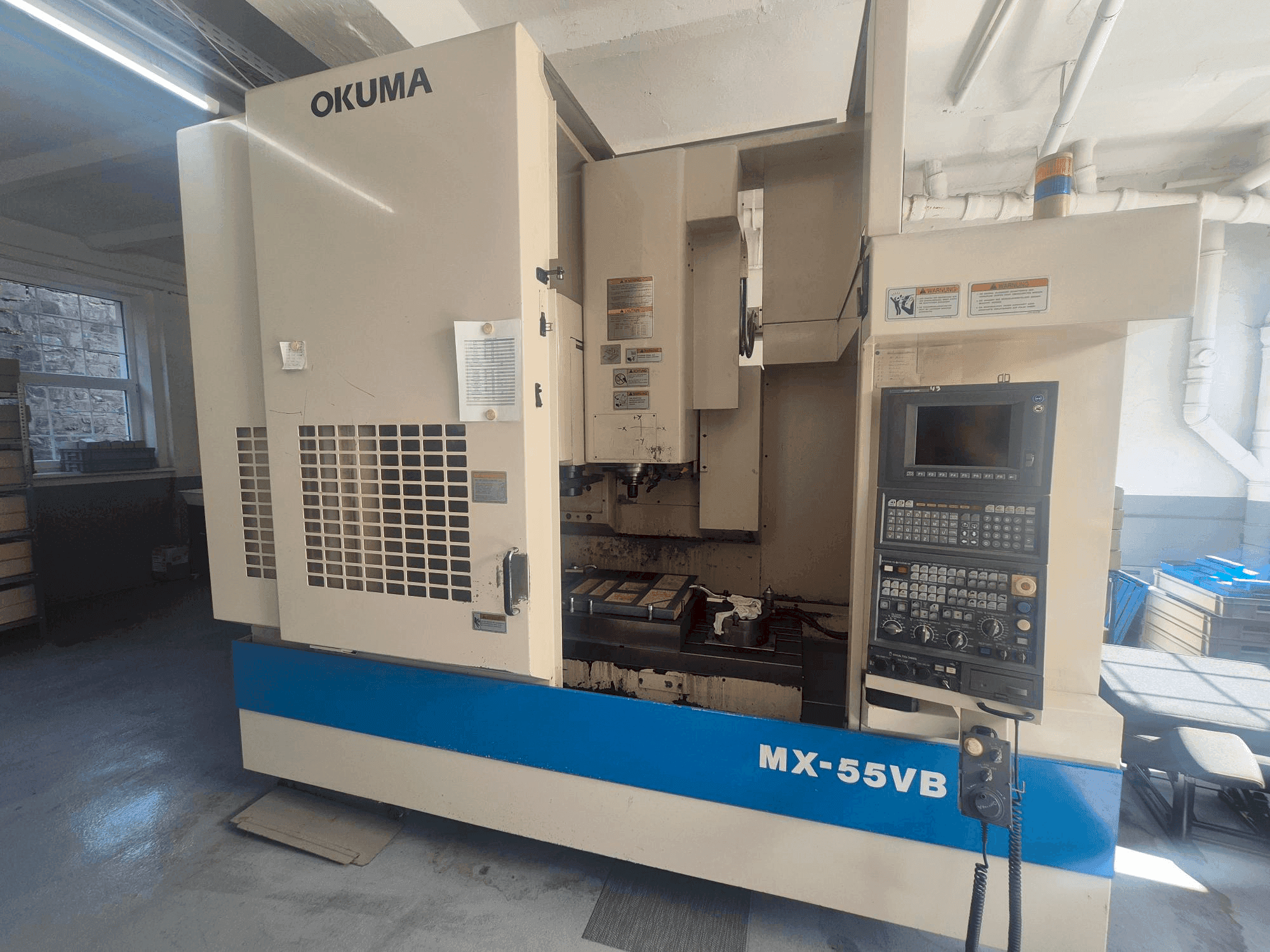 Prikaz stroja Okuma MX-55VB sprijeda