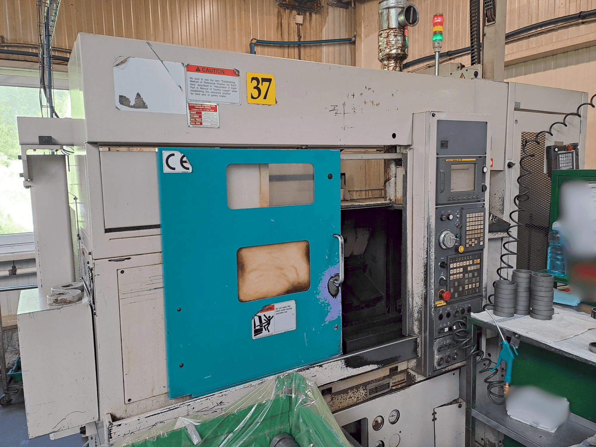 Prikaz stroja Takisawa TC 200 sprijeda