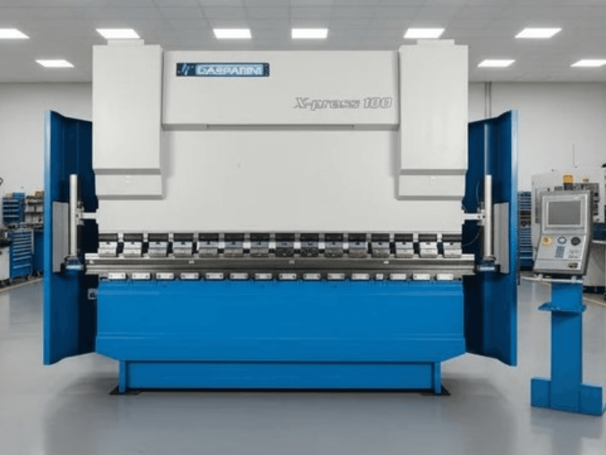 GASPARINI X-Press 100 hidraulična preša, prednji pogled, s plavom vanjštinom i upravljačkom pločom na desnoj strani.