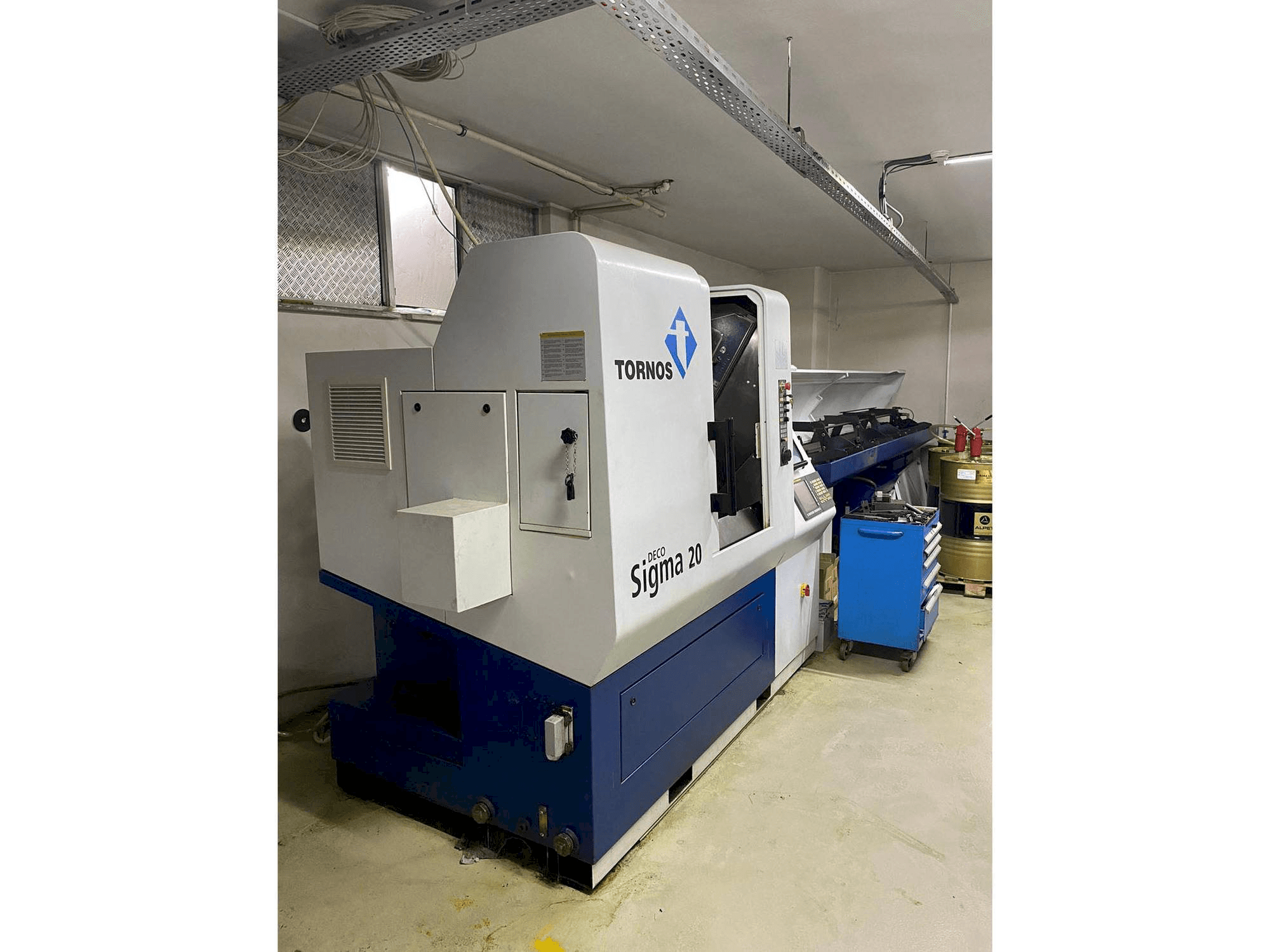 Prikaz lijeve strane stroja Tornos Delta Sigma 20