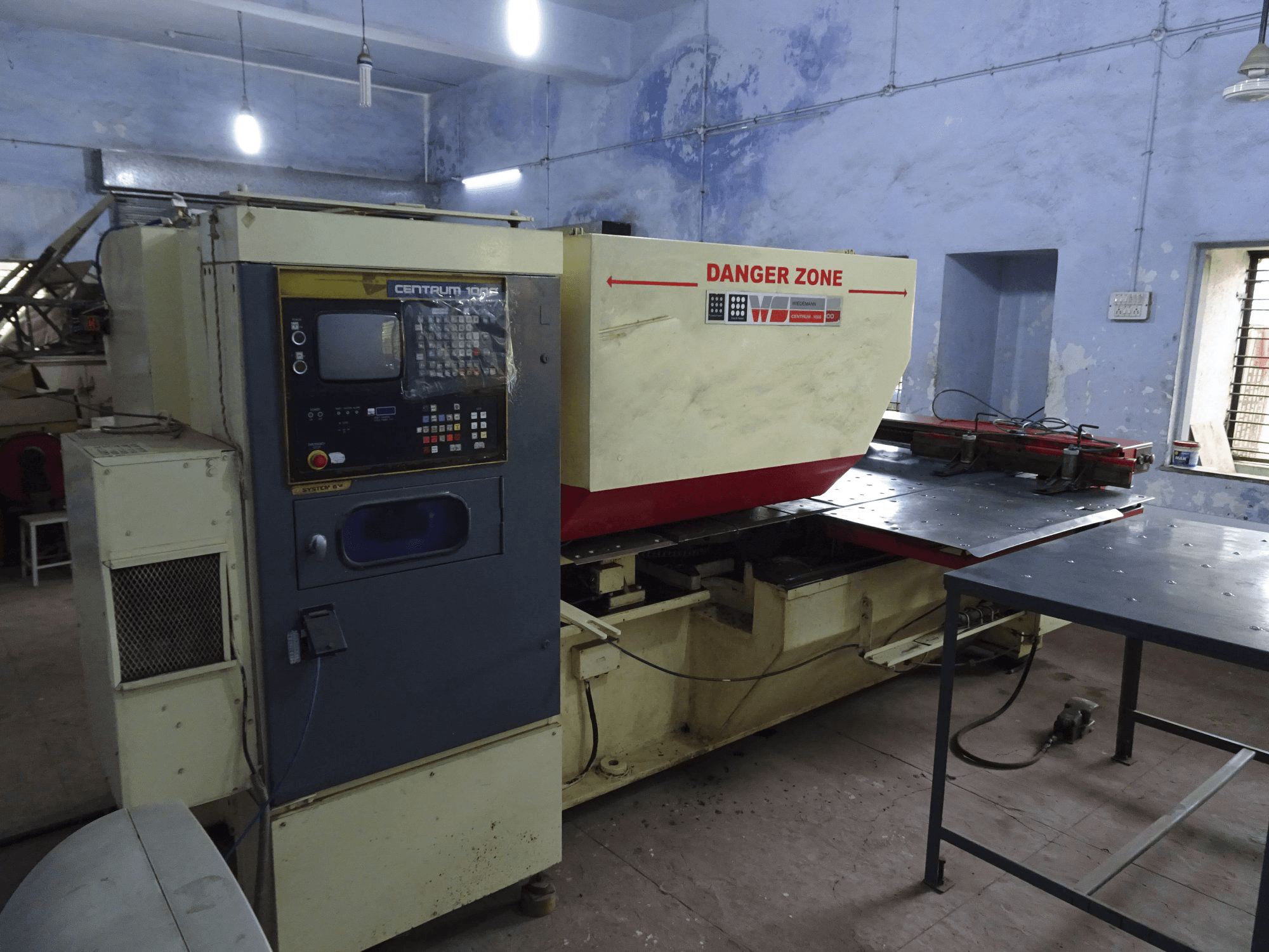 Prikaz stroja Murata Wiedemann C-1000 slijeva