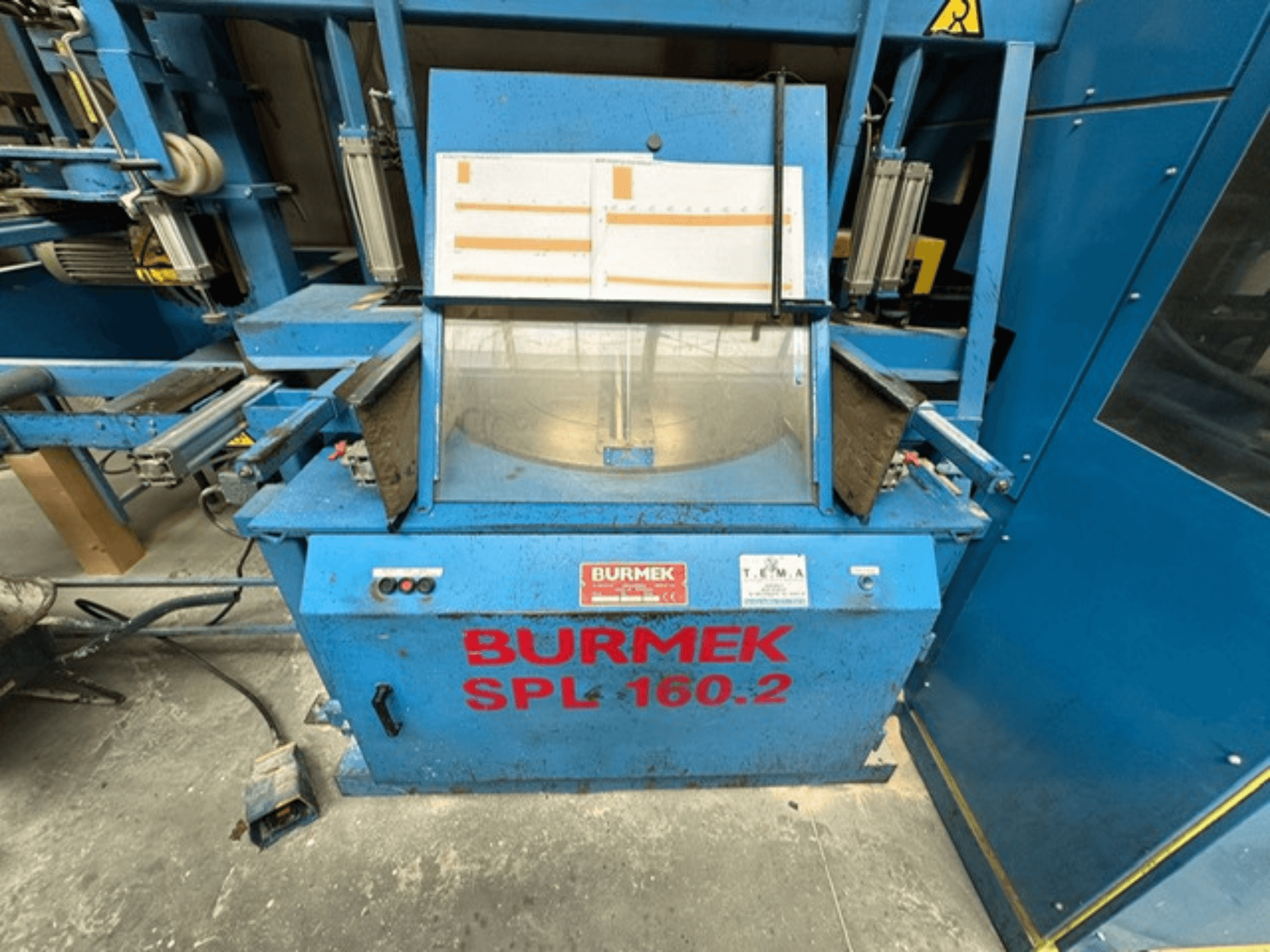 Plavi stroj za obradu drva BURMEK SPL 160.2, prednji pogled, s tipkama za upravljanje i staklenom pločom koja prikazuje unutrašnjost.
