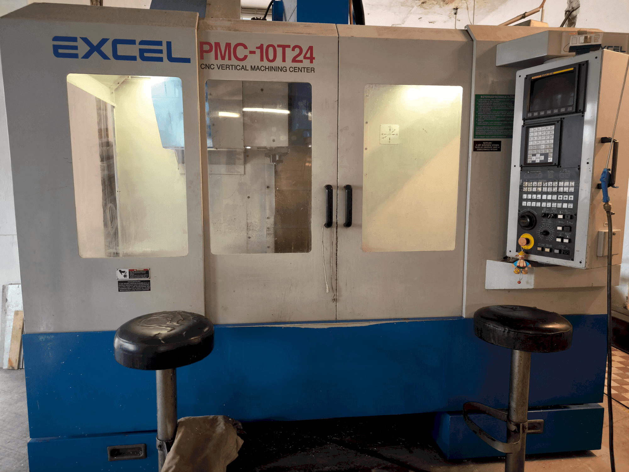 Prikaz stroja Excel Excel PMC 10T24 (2004) sprijeda