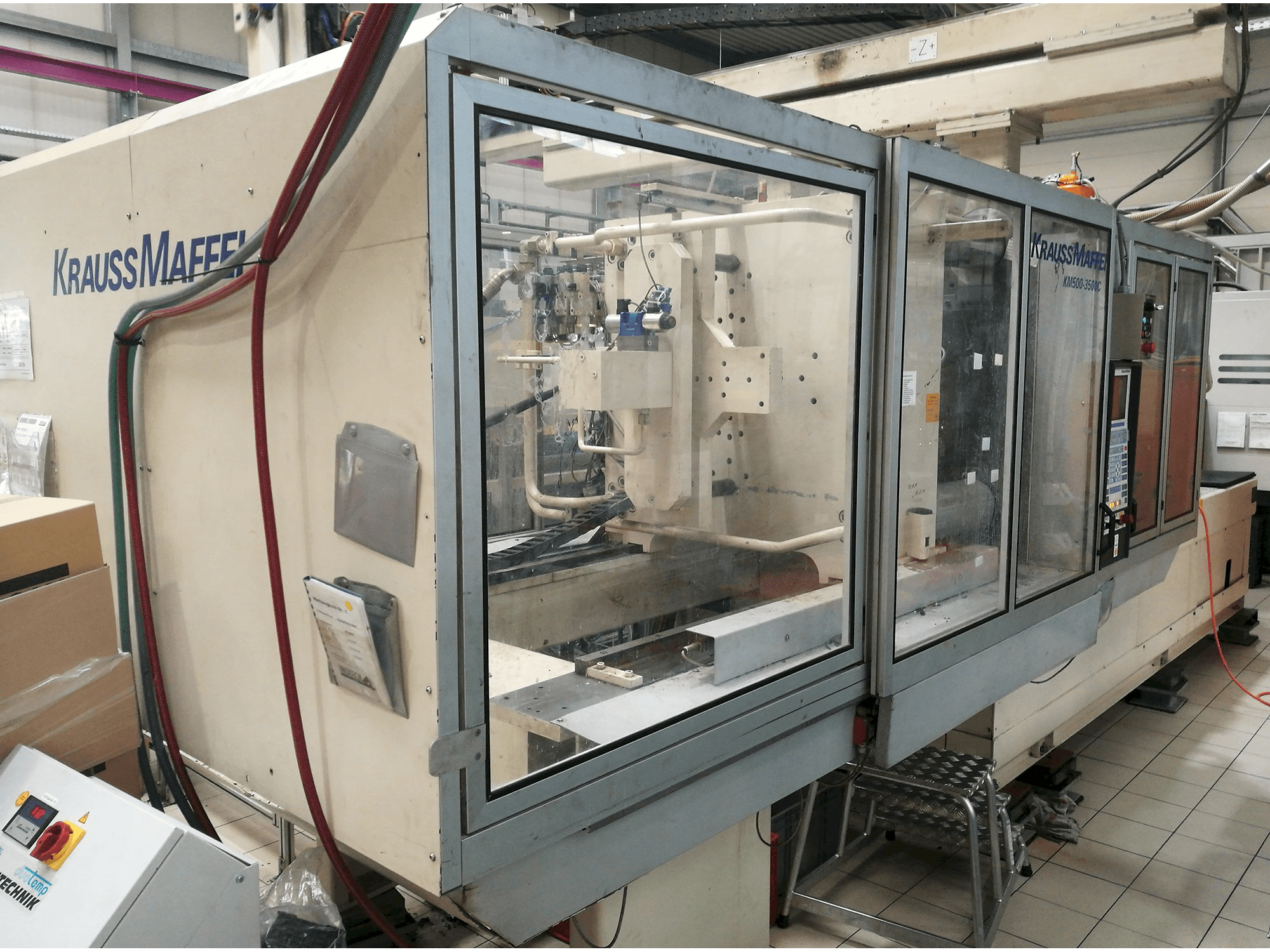 Prikaz stroja Krauss Maffei KM 500-3500 C1 slijeva