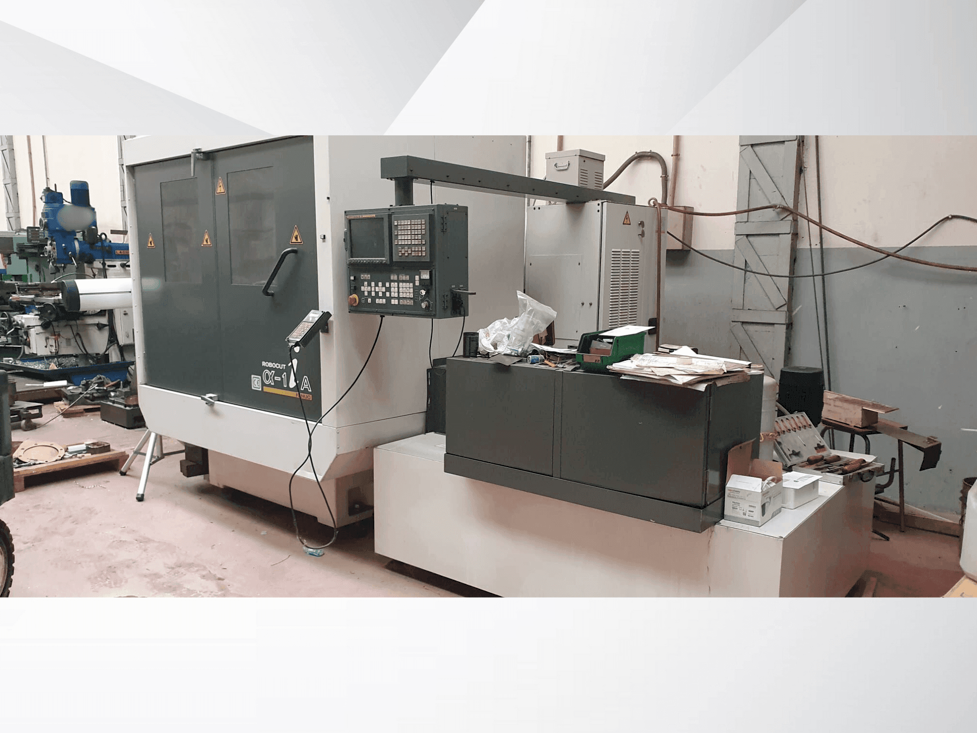 Prikaz stroja FANUC Aplha-1iA sprijeda