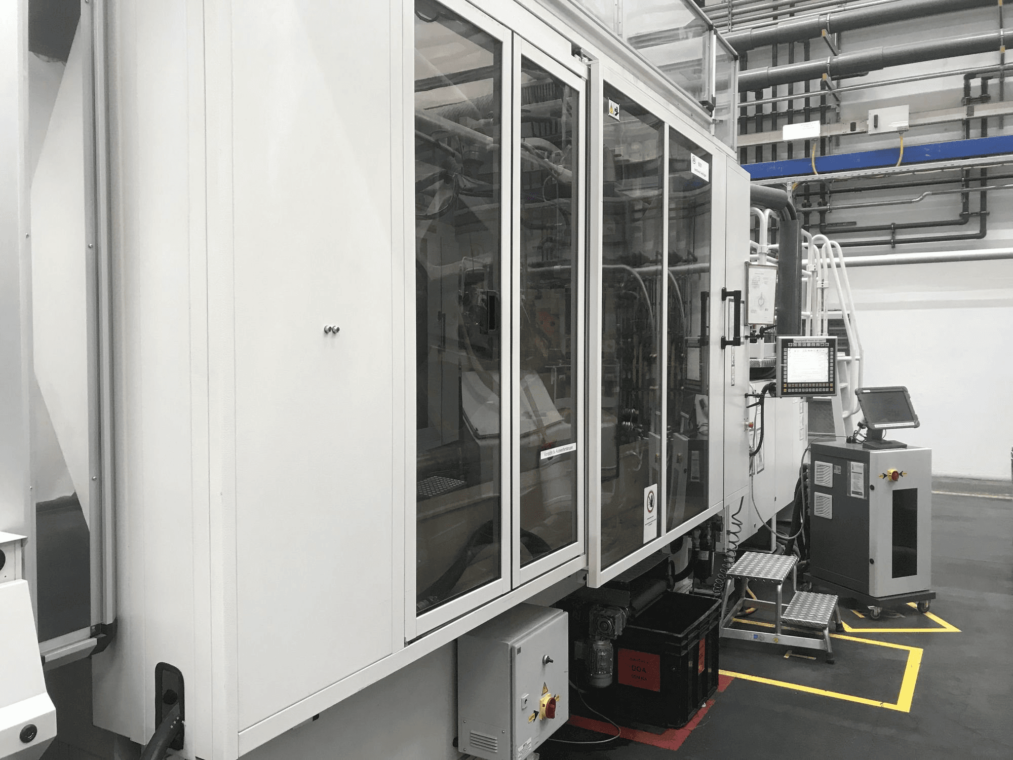 Prikaz lijeve strane stroja Husky H500 RS 65/60