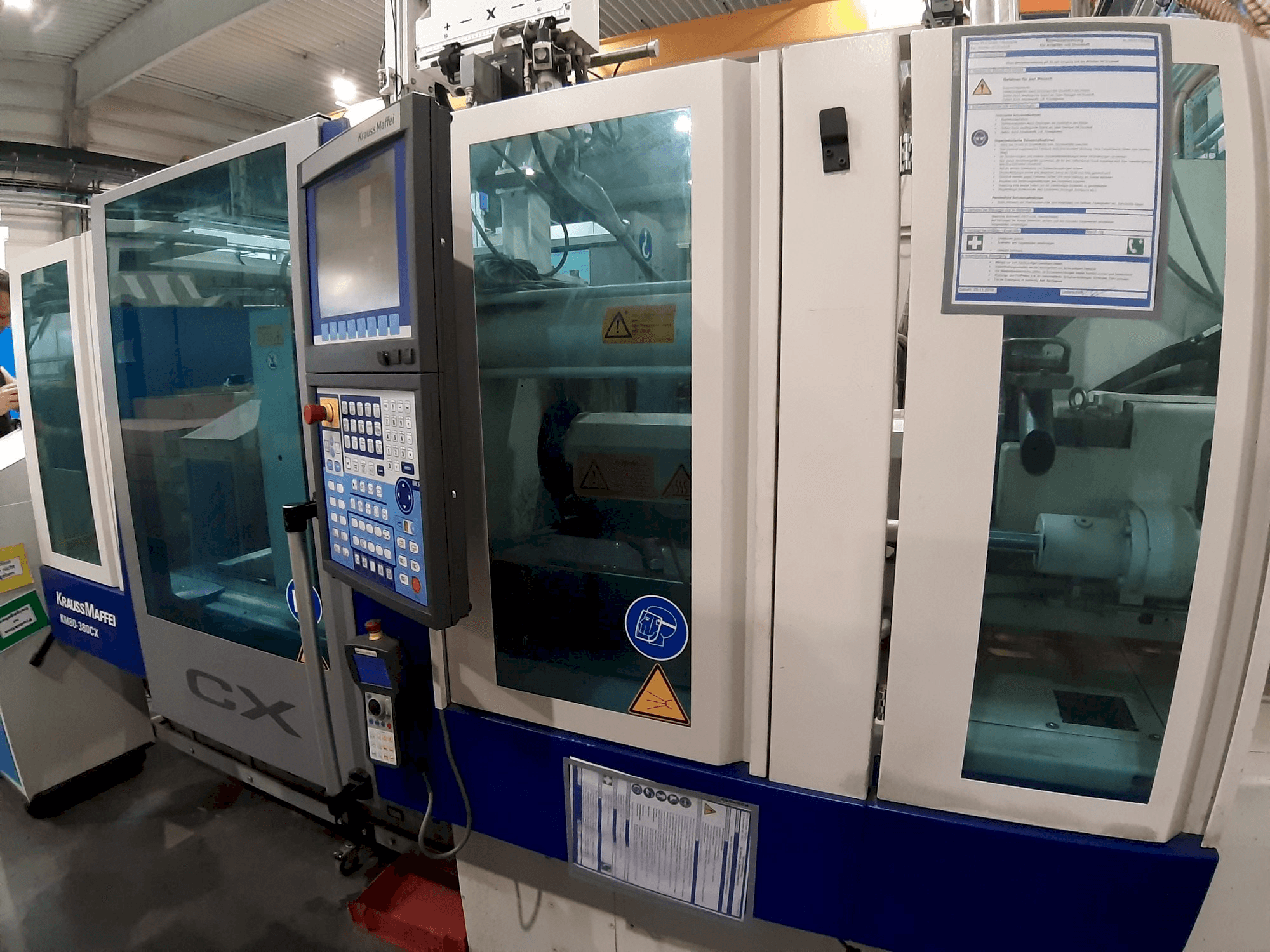 Prikaz stroja Krauss Maffei 80 - 380 CX sprijeda