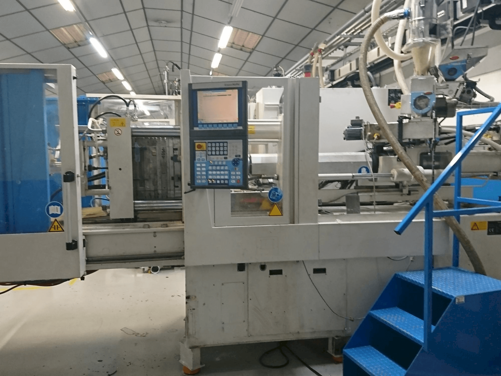 Prikaz stroja Krauss Maffei 80-750 CX sprijeda