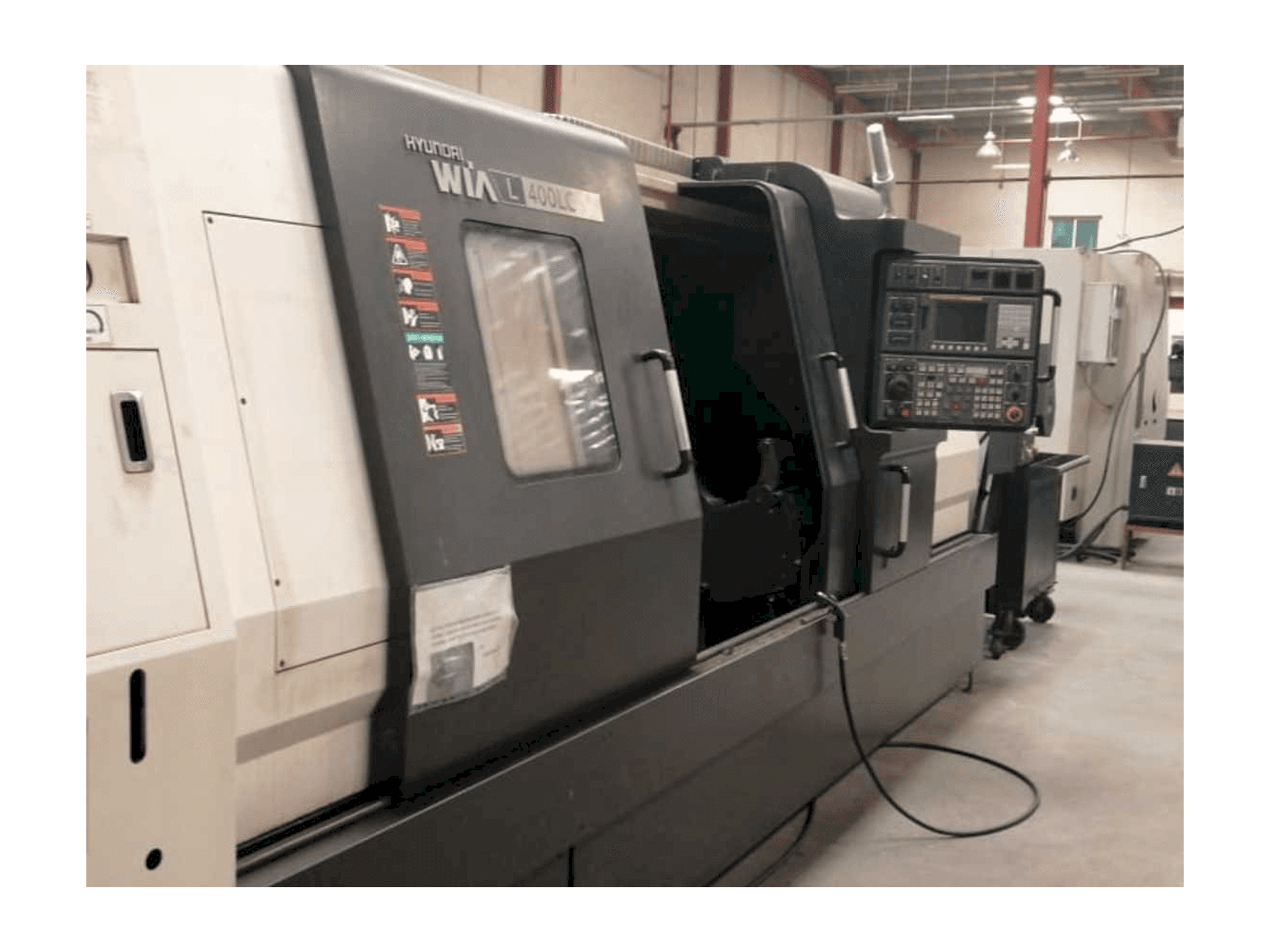 Prikaz lijeve strane stroja Hyundai Wia L400LC