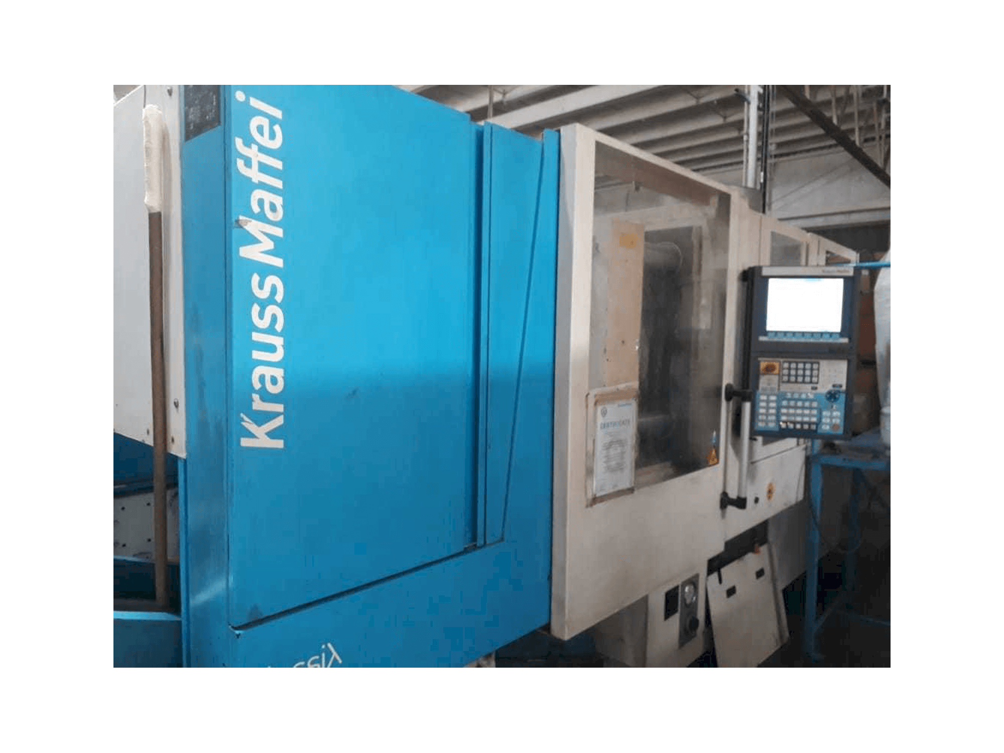 Prikaz stroja Krauss Maffei 160/750 CX sprijeda