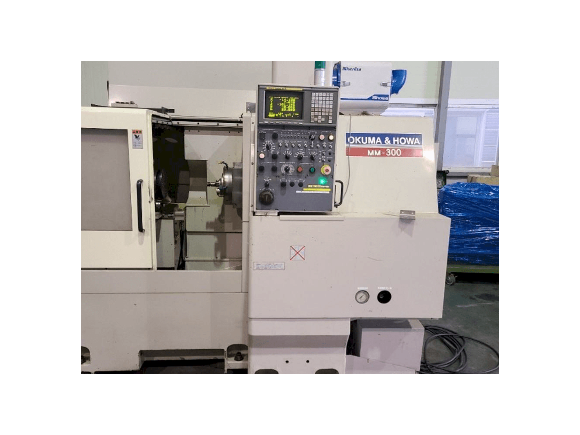 Prikaz stroja OKUMA&HOWA MM-300 sprijeda