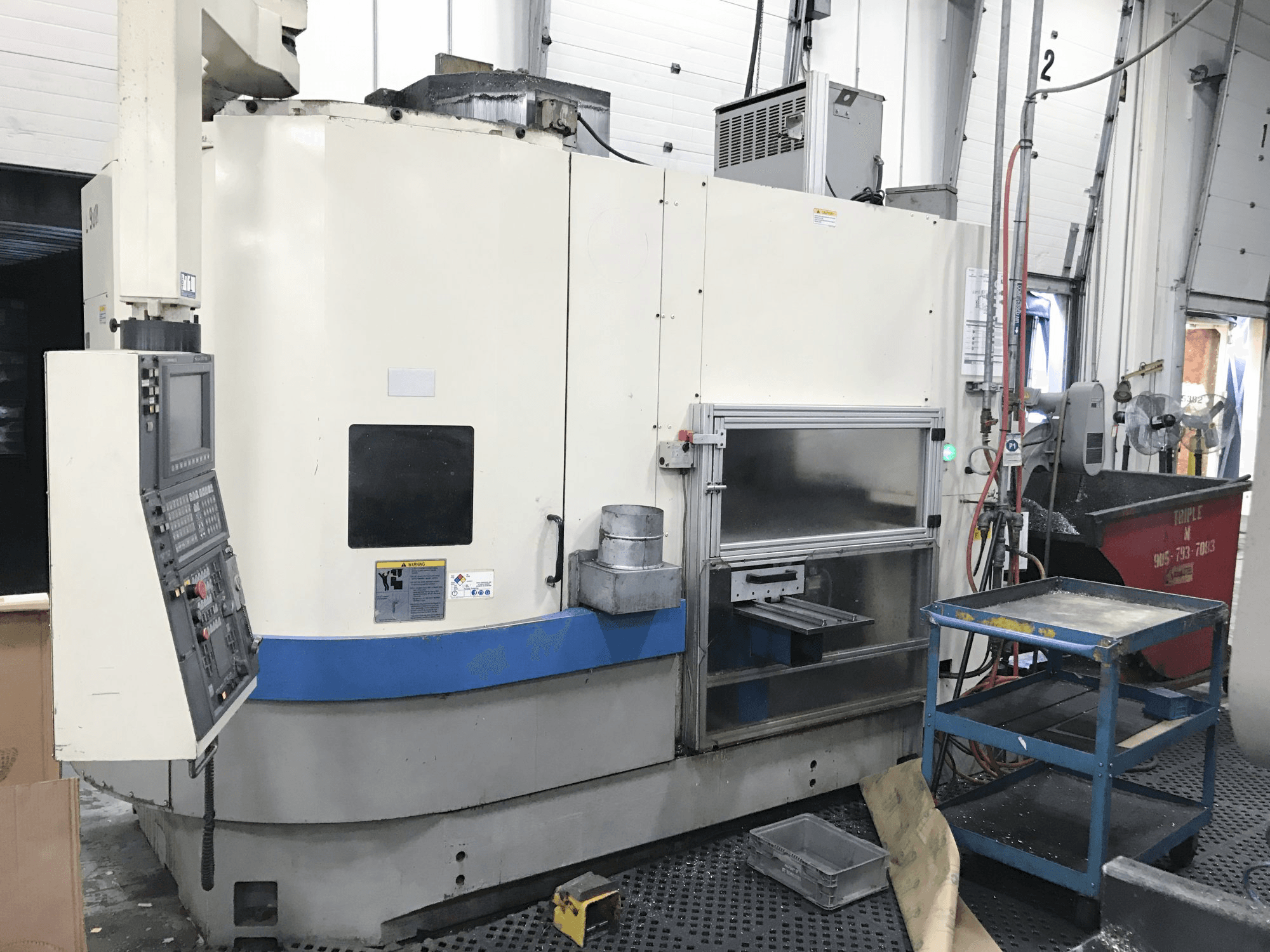Prikaz stroja Okuma LVT 400 slijeva