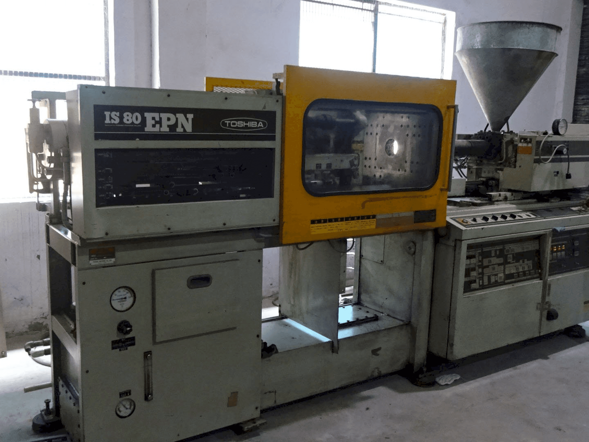 Prikaz stroja Toshiba IS 80 EPN 2A slijeva