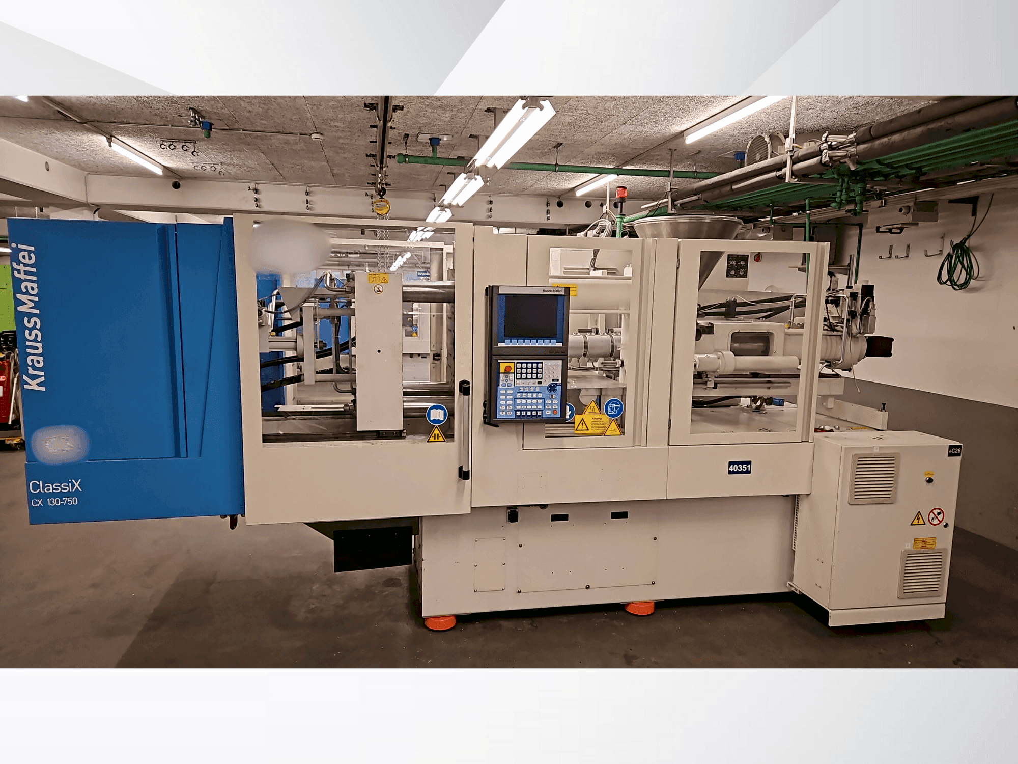 Prikaz stroja Krauss Maffei 130-750 CX sprijeda