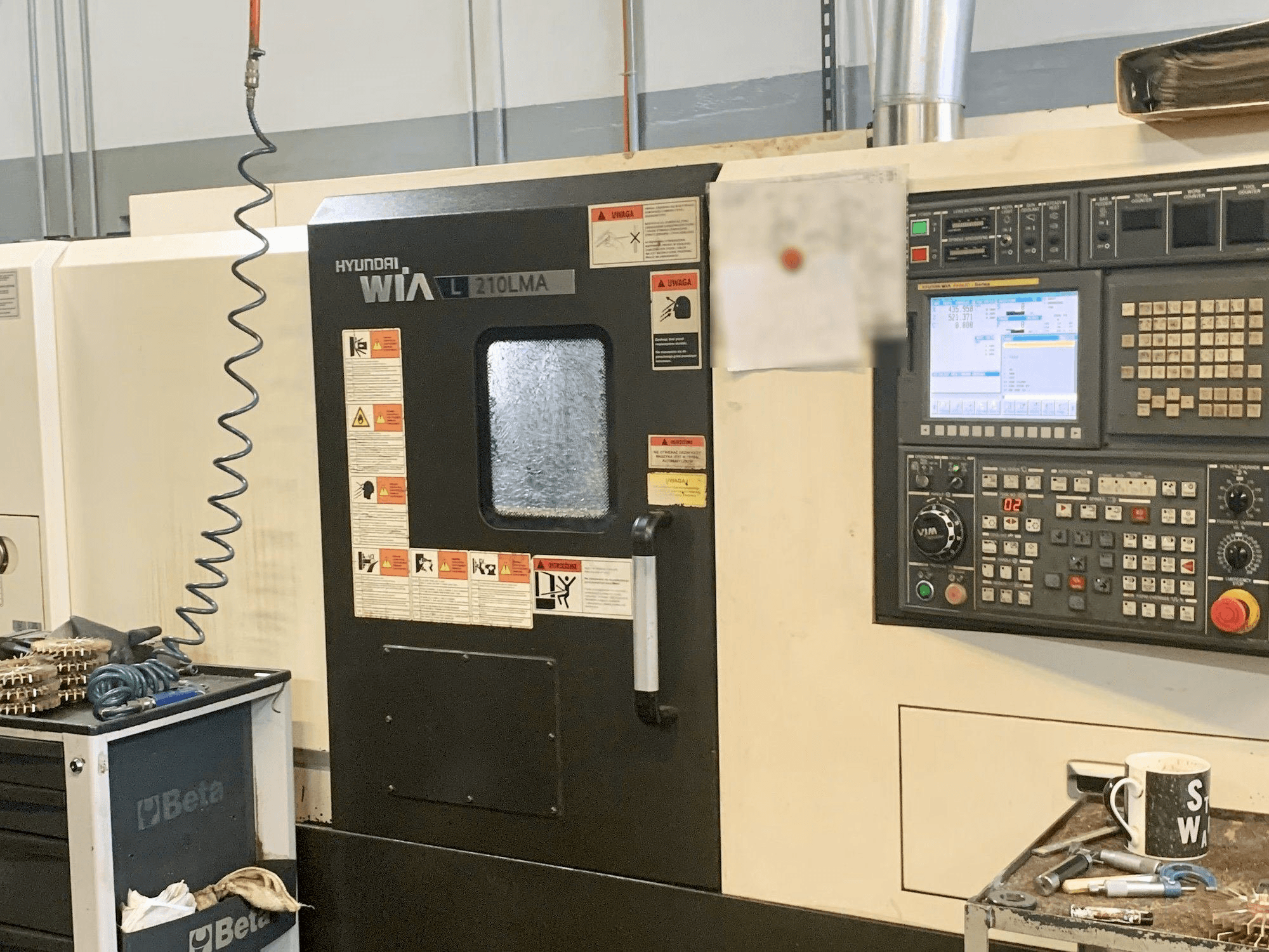 Prikaz stroja Hyundai Wia L210LMA sprijeda