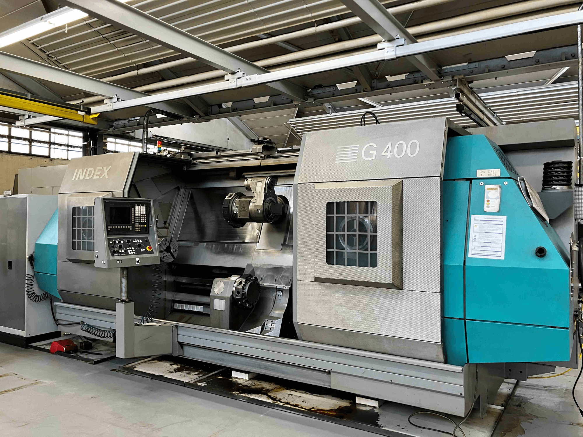 INDEX G400 CNC tokarski stroj, prednji pogled, s upravljačkom pločom s numeričkim zaslonom i dvostrukim vretenom za preciznu obradu.