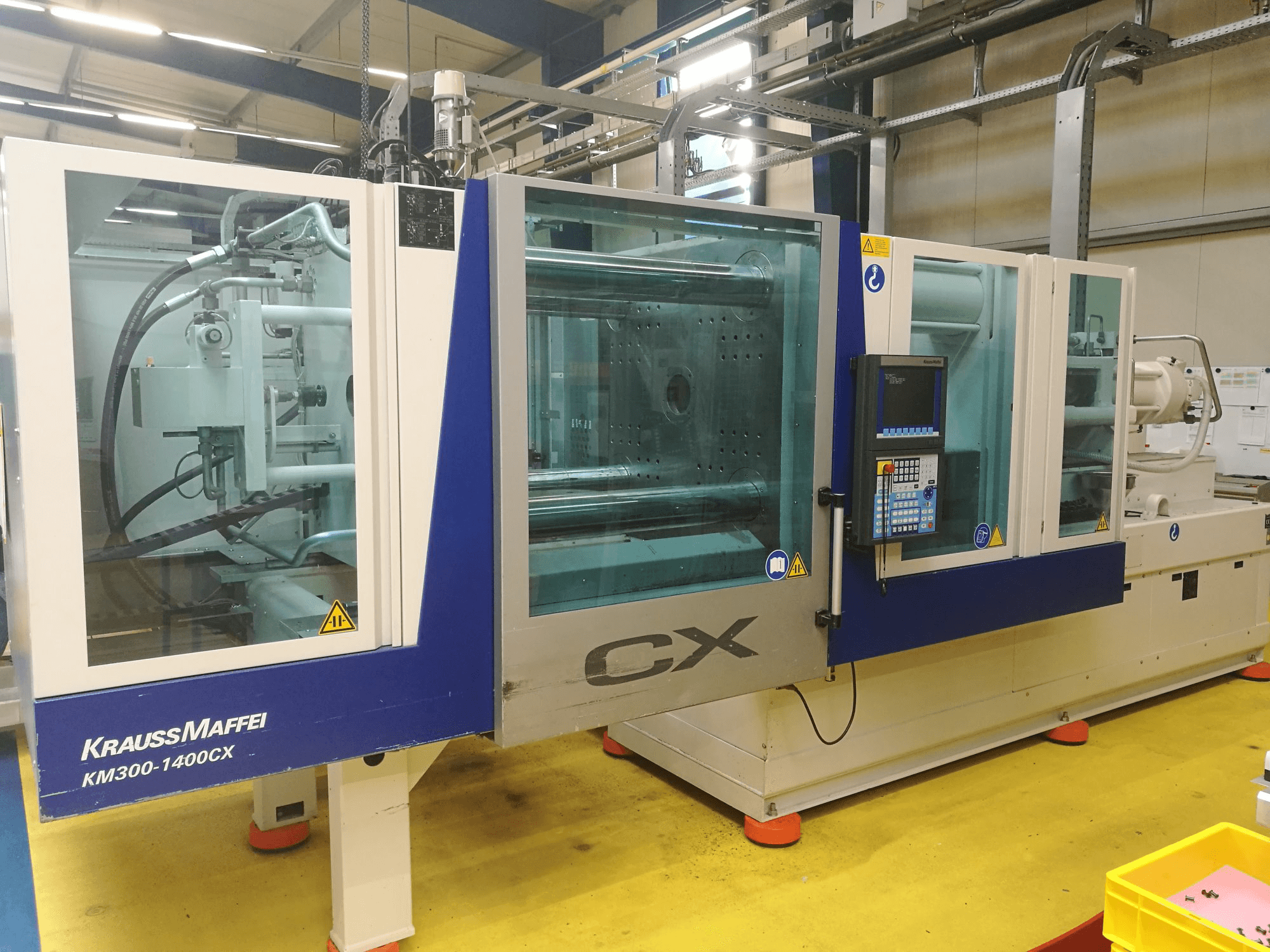 Prikaz stroja Krauss Maffei 300-1400 CX sprijeda