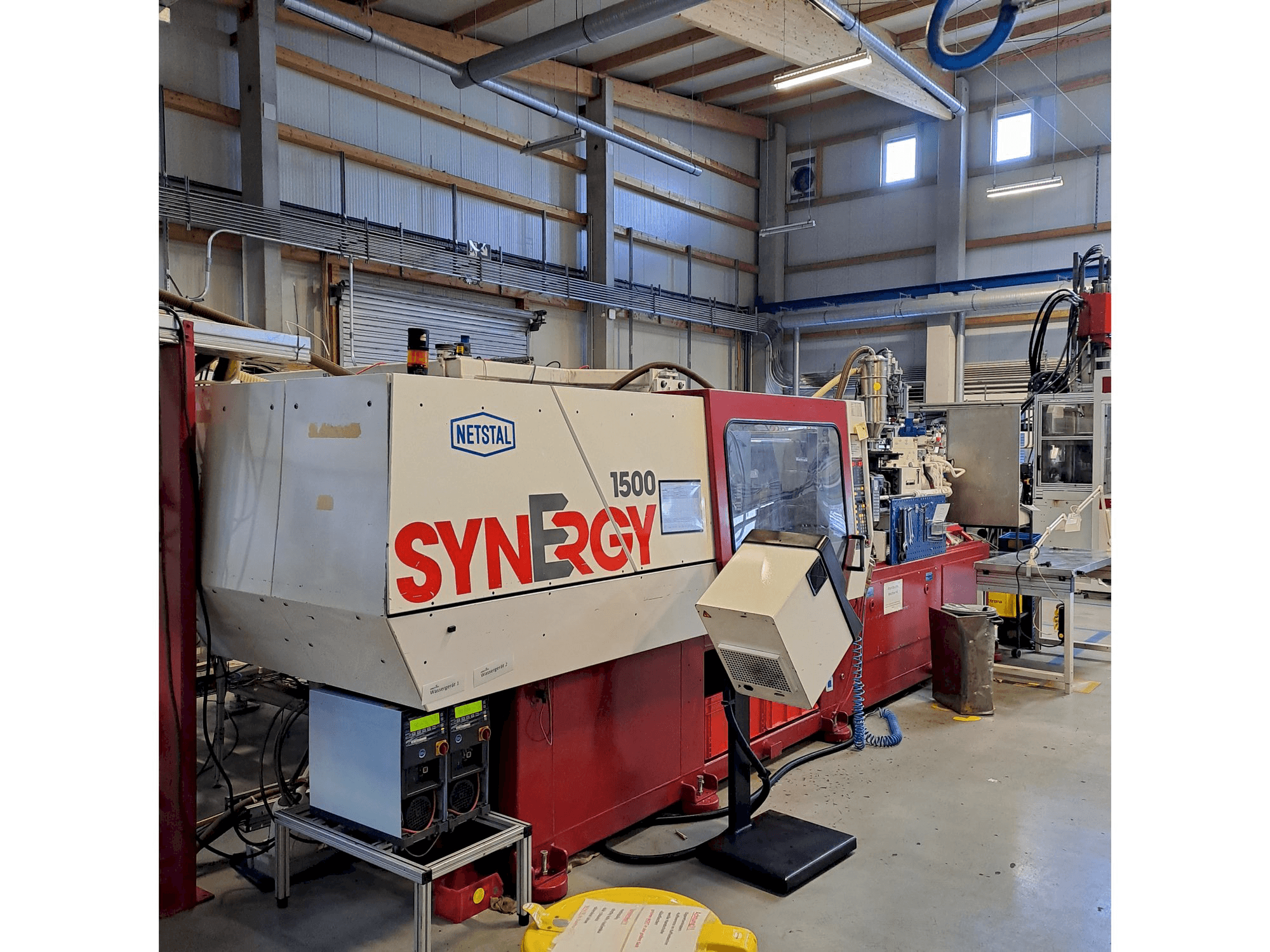 Prikaz stroja Netstal S 1500 - 460 sprijeda