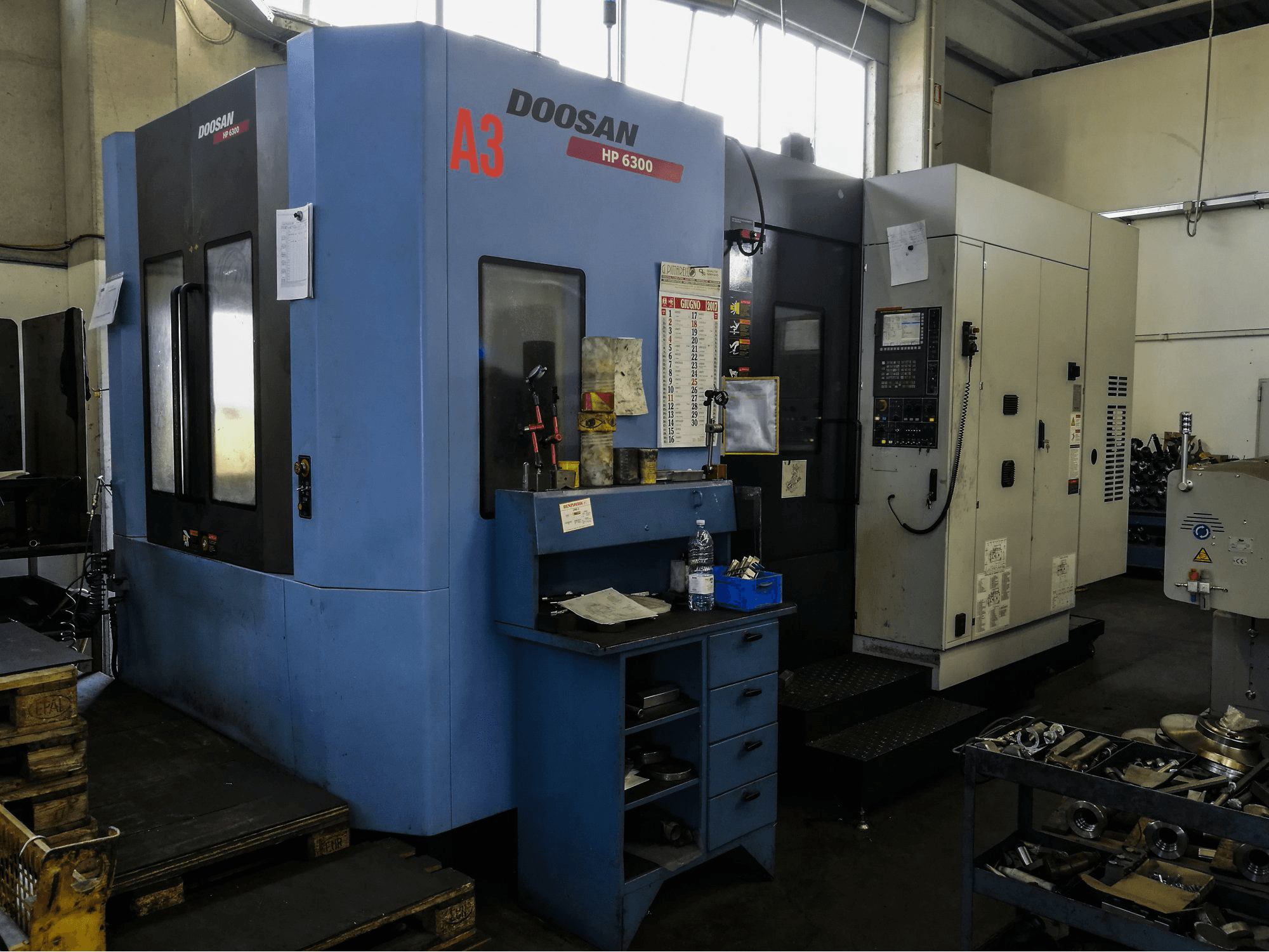 Prikaz stroja Doosan HP 6300 slijeva