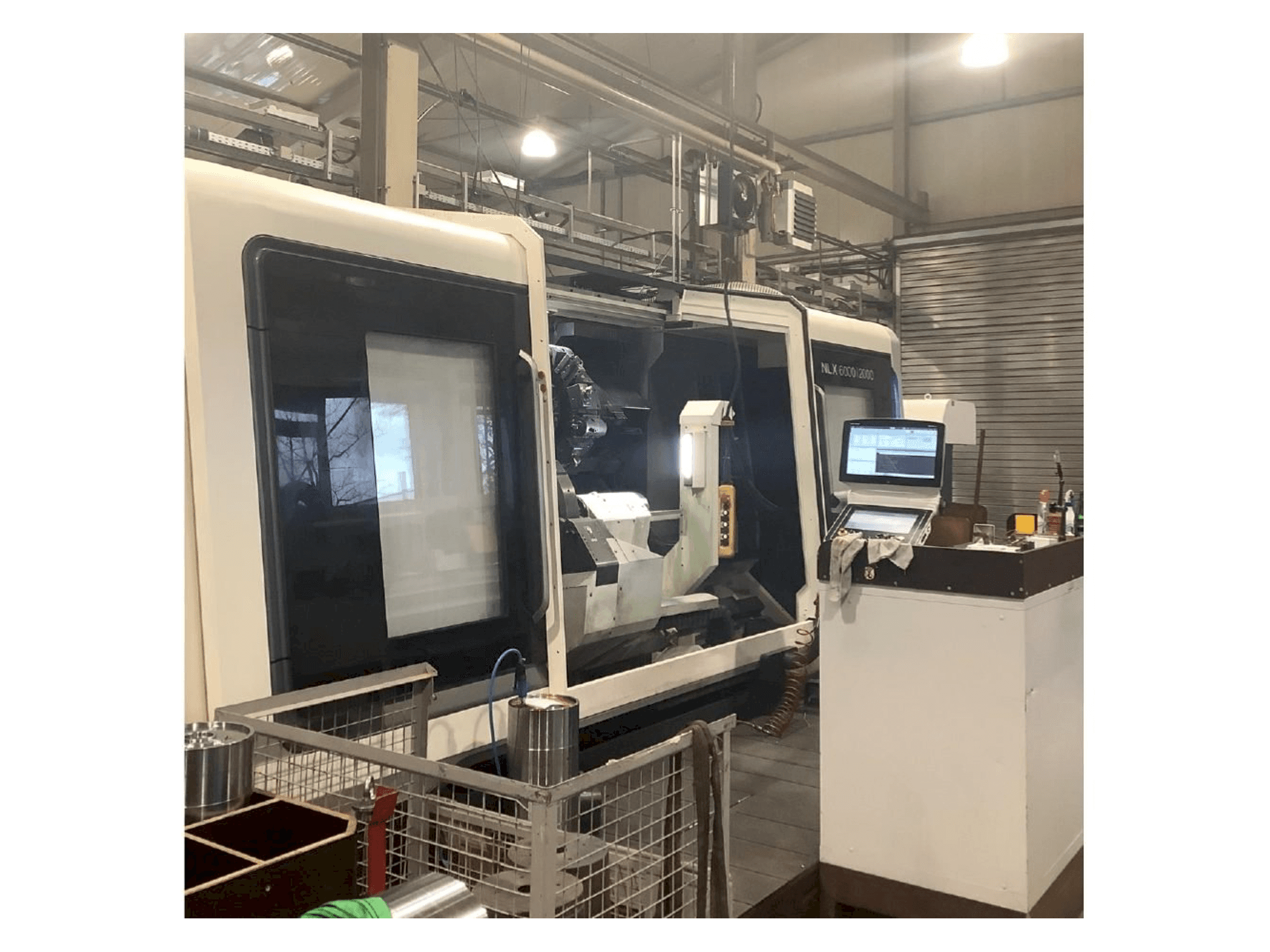 Prikaz stroja DMG MORI NLX 6000 | 2000 sprijeda