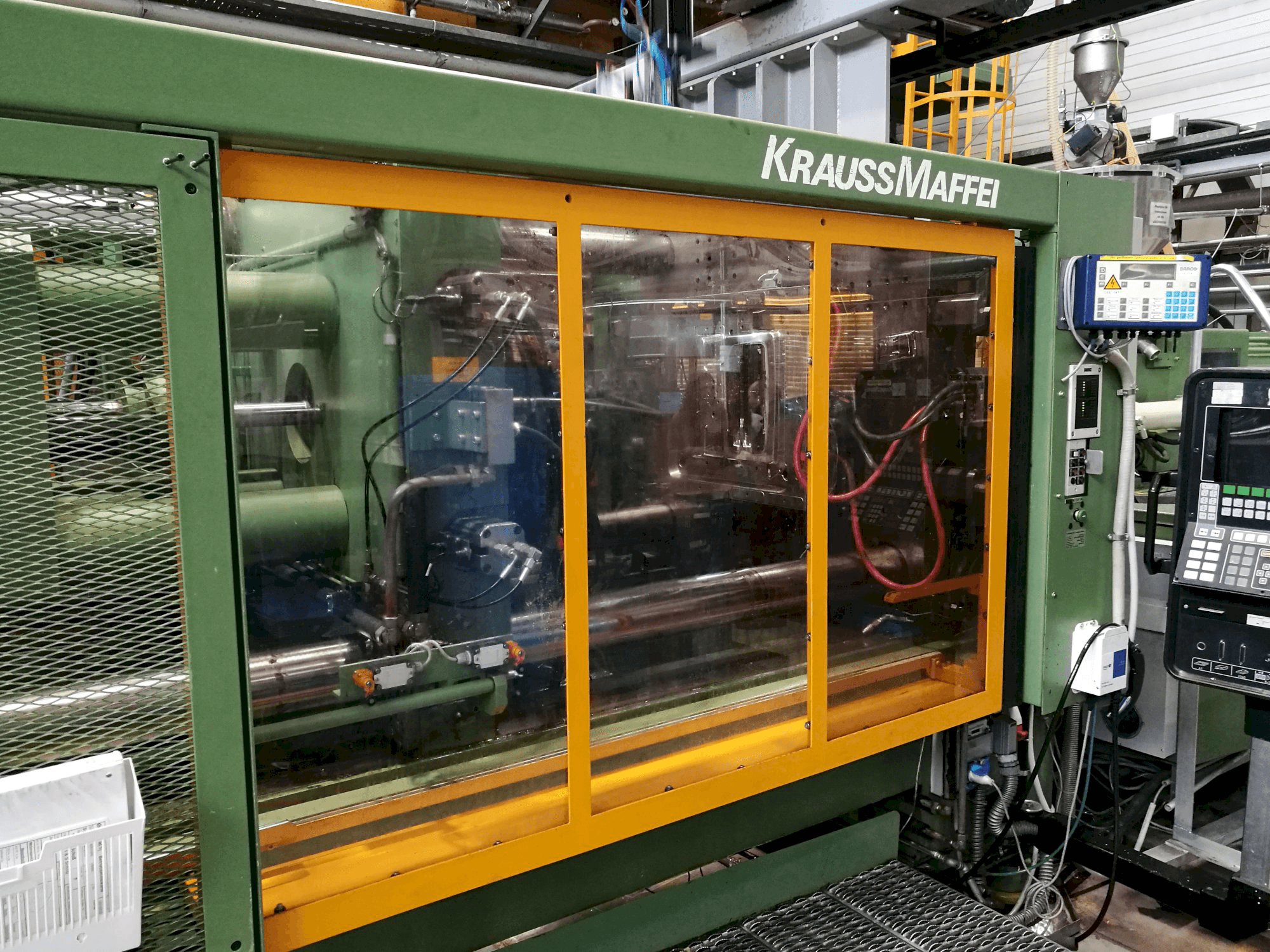 Prikaz stroja Krauss Maffei 650-2300 B2 slijeva