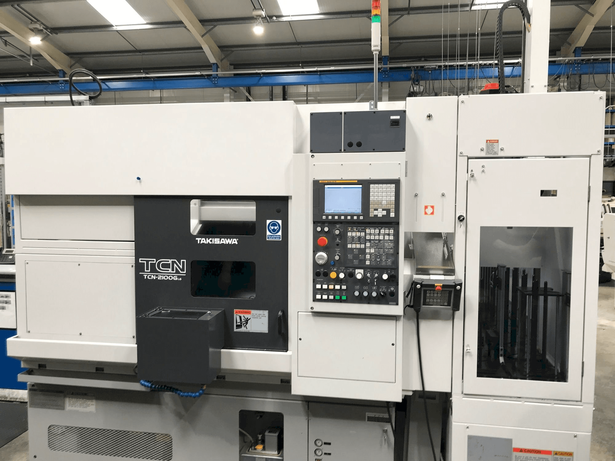 Prikaz stroja Takisawa TCN-2100G L6 sprijeda