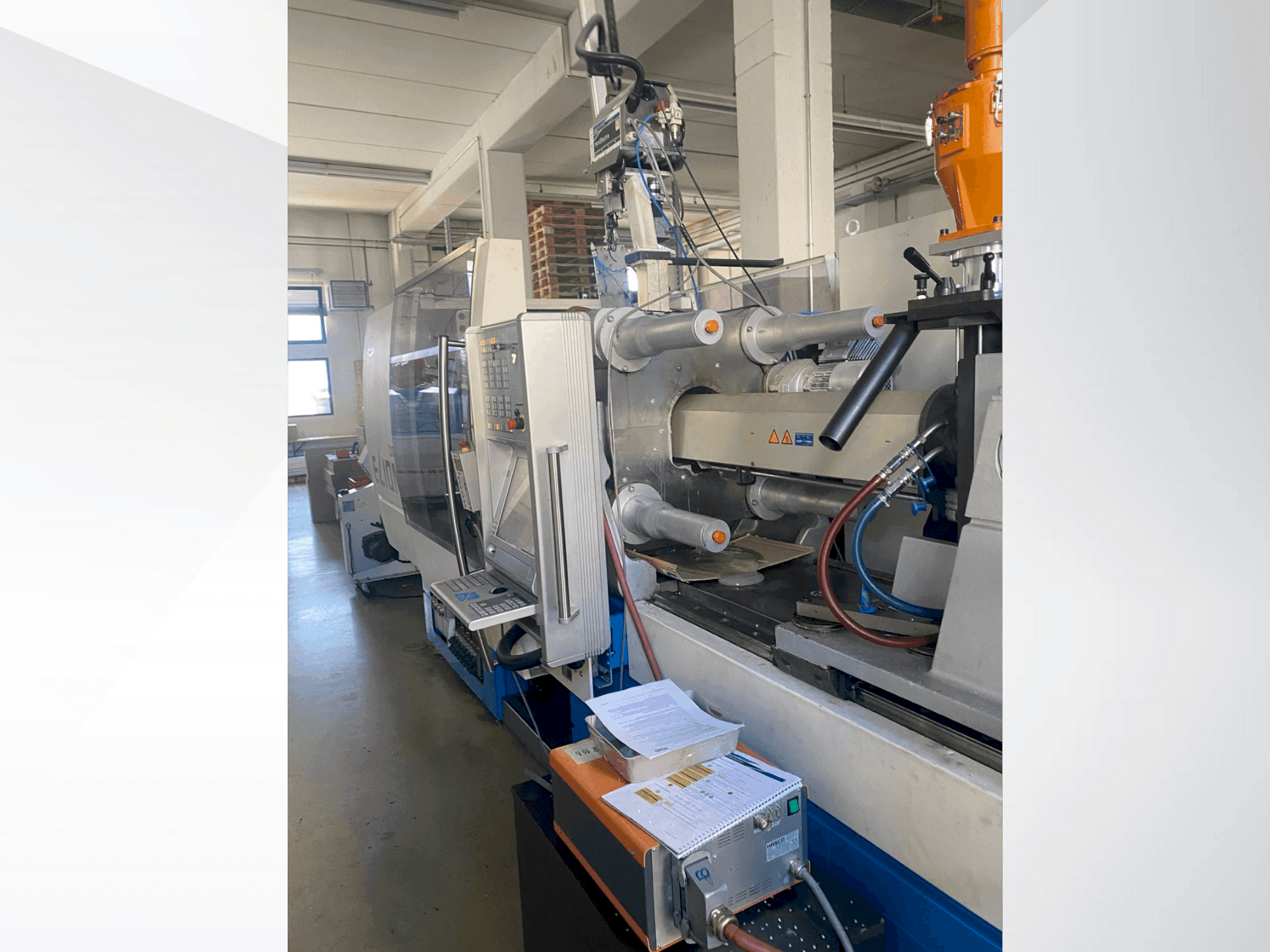 Prikaz stroja Netstal ELION 1200-530 PM sprijeda