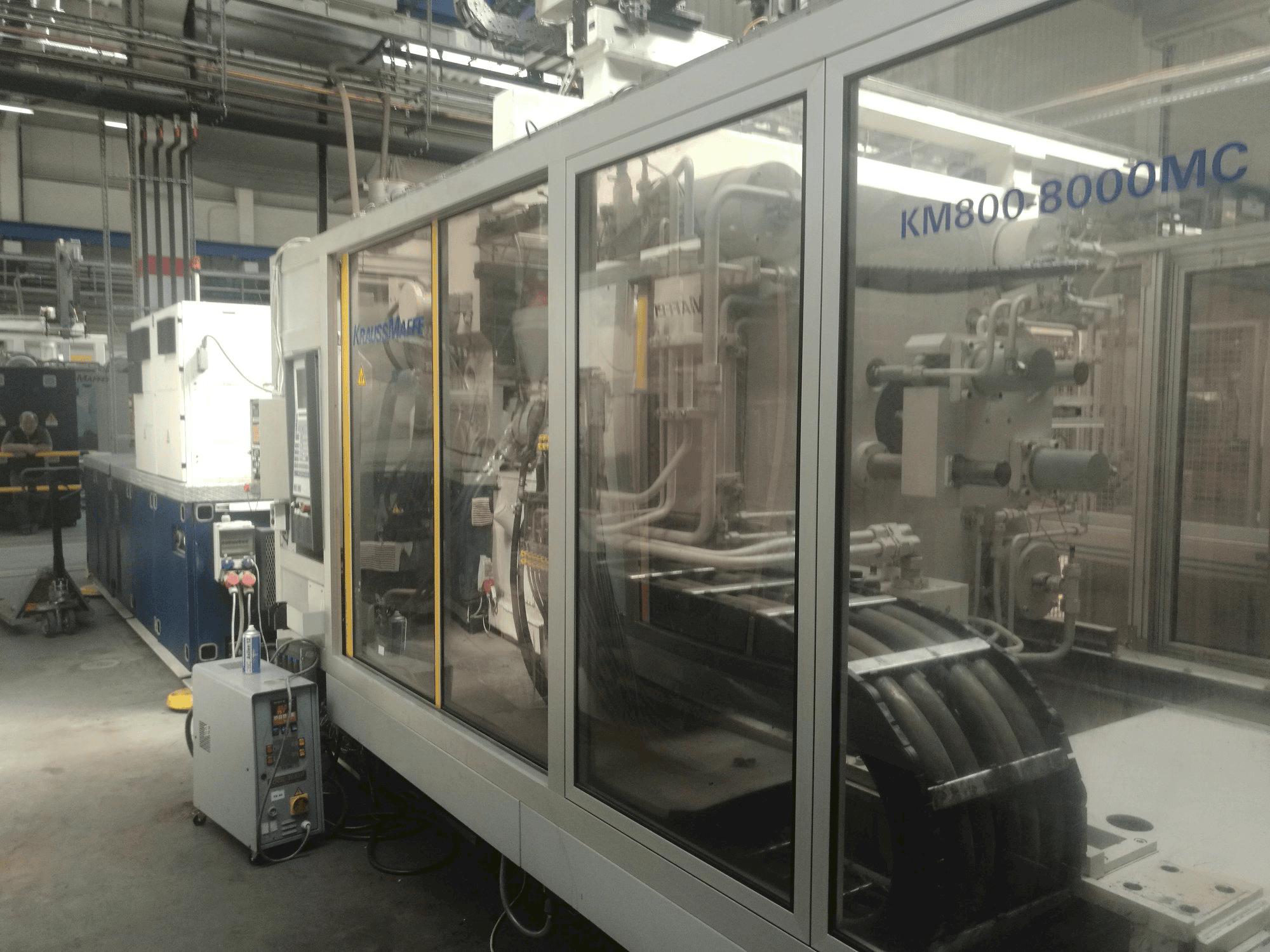 Prikaz stroja Krauss Maffei 800-8000 MC sprijeda