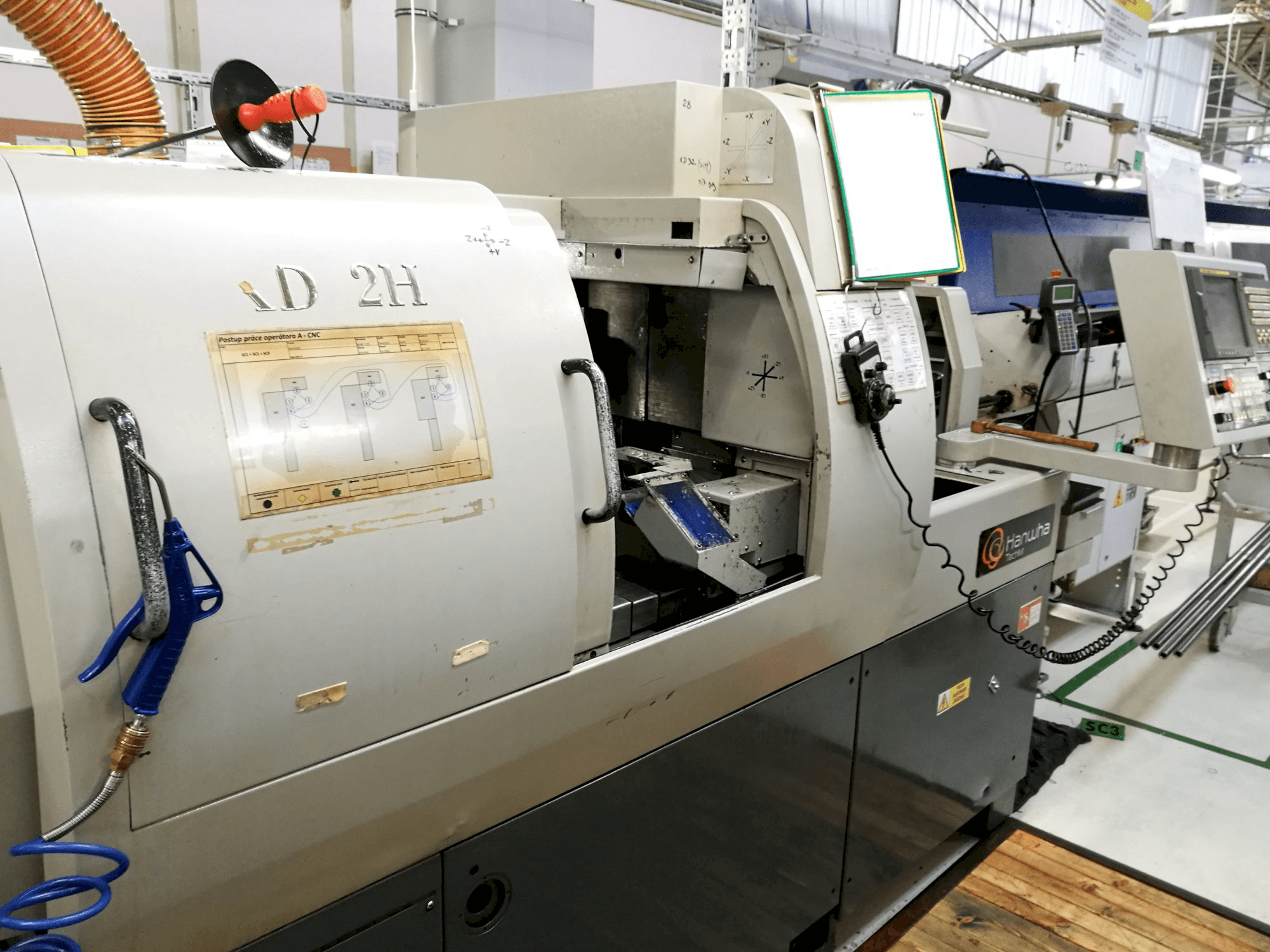 Prikaz stroja Hanwha XD 32 H zdesna