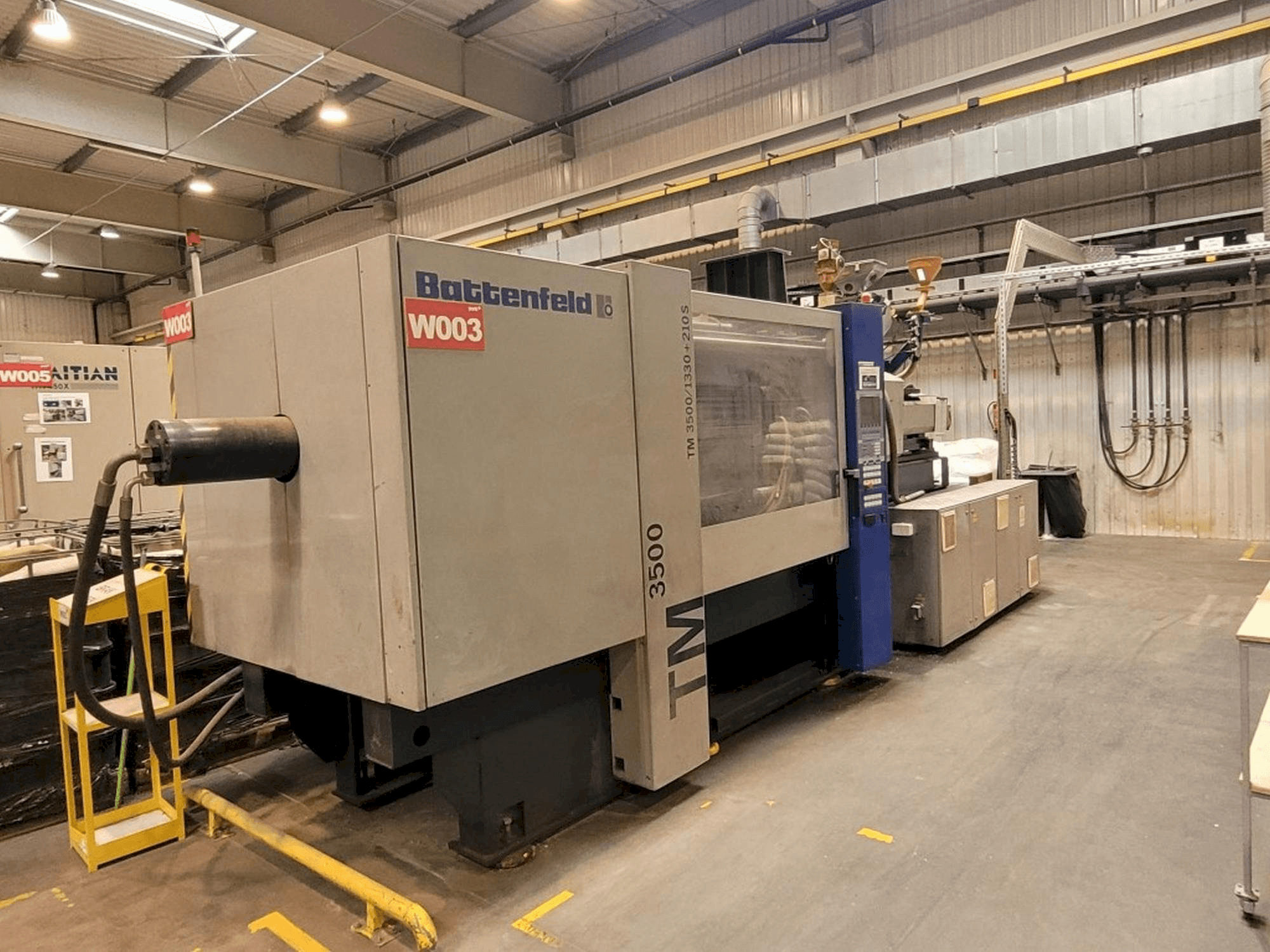 Prikaz stroja Battenfeld TM 3500/1330+210S sprijeda