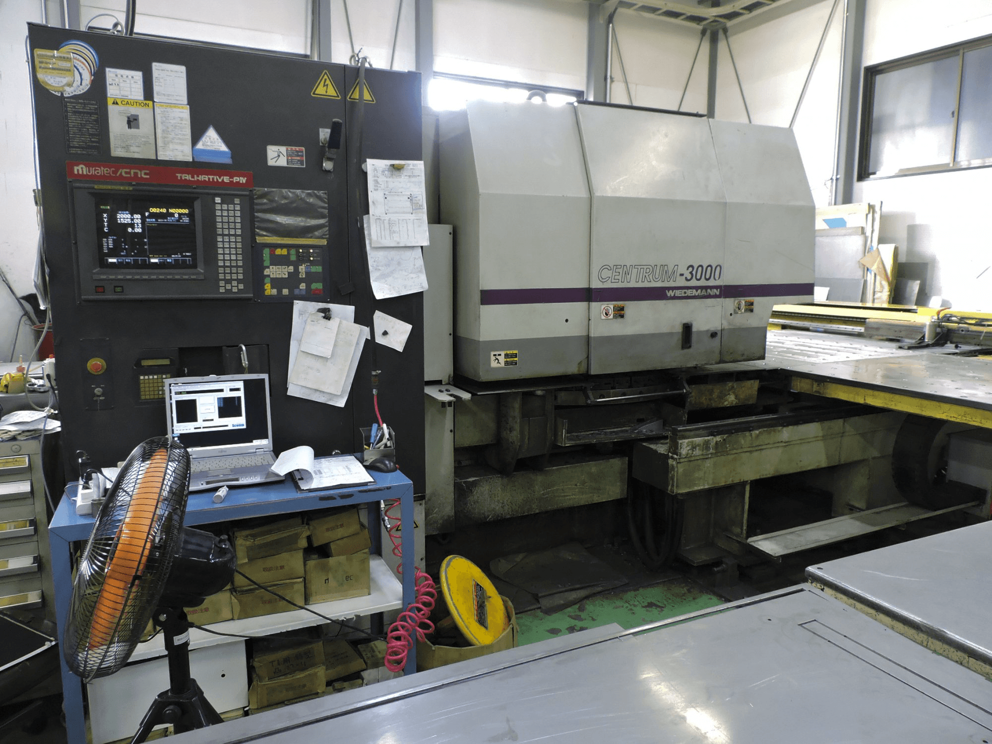 Prikaz lijeve strane 1 stroja Murata Wiedemann C-3000