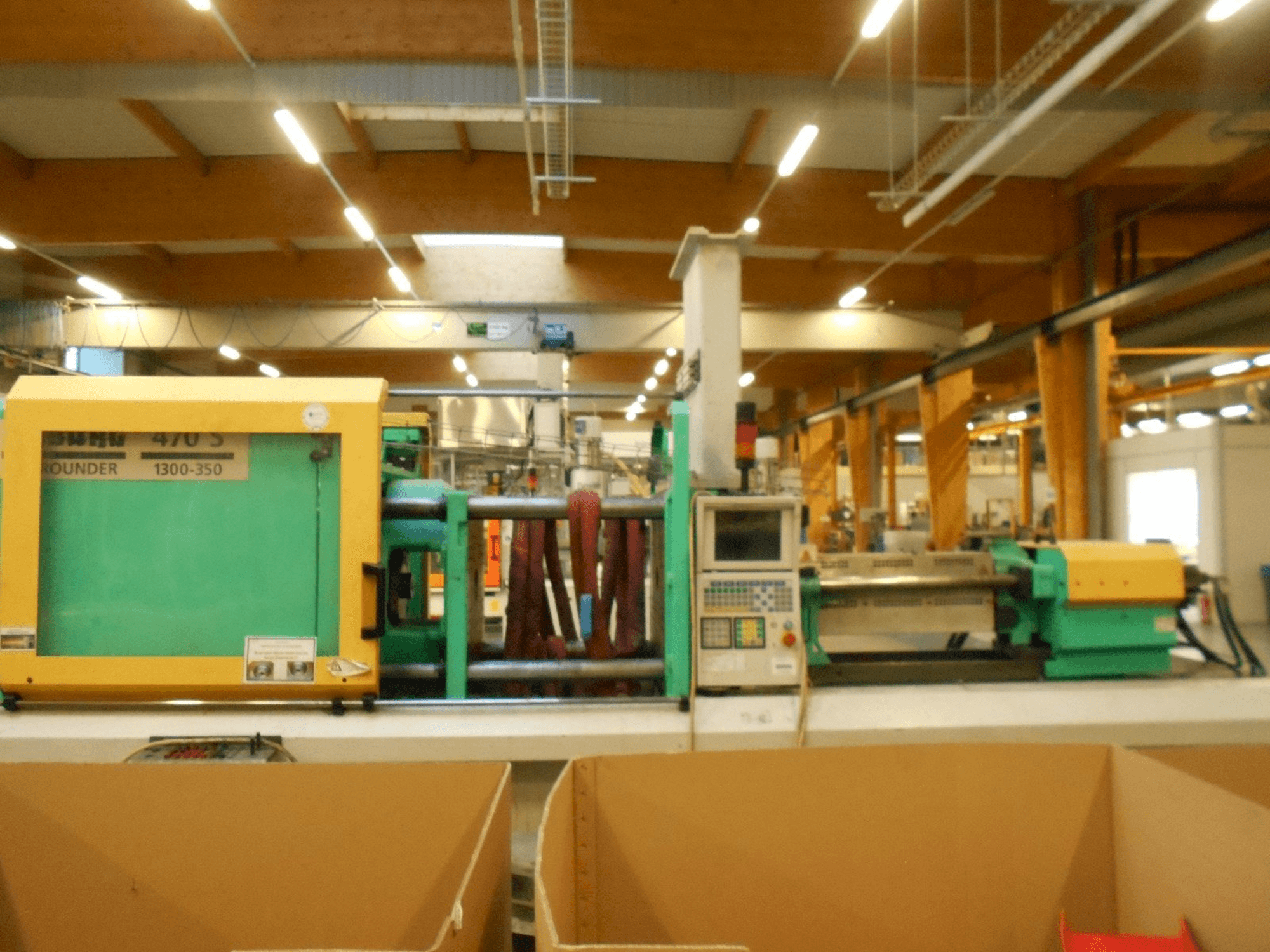 Prikaz stroja Arburg Allrounder 470 S 1300-350 sprijeda