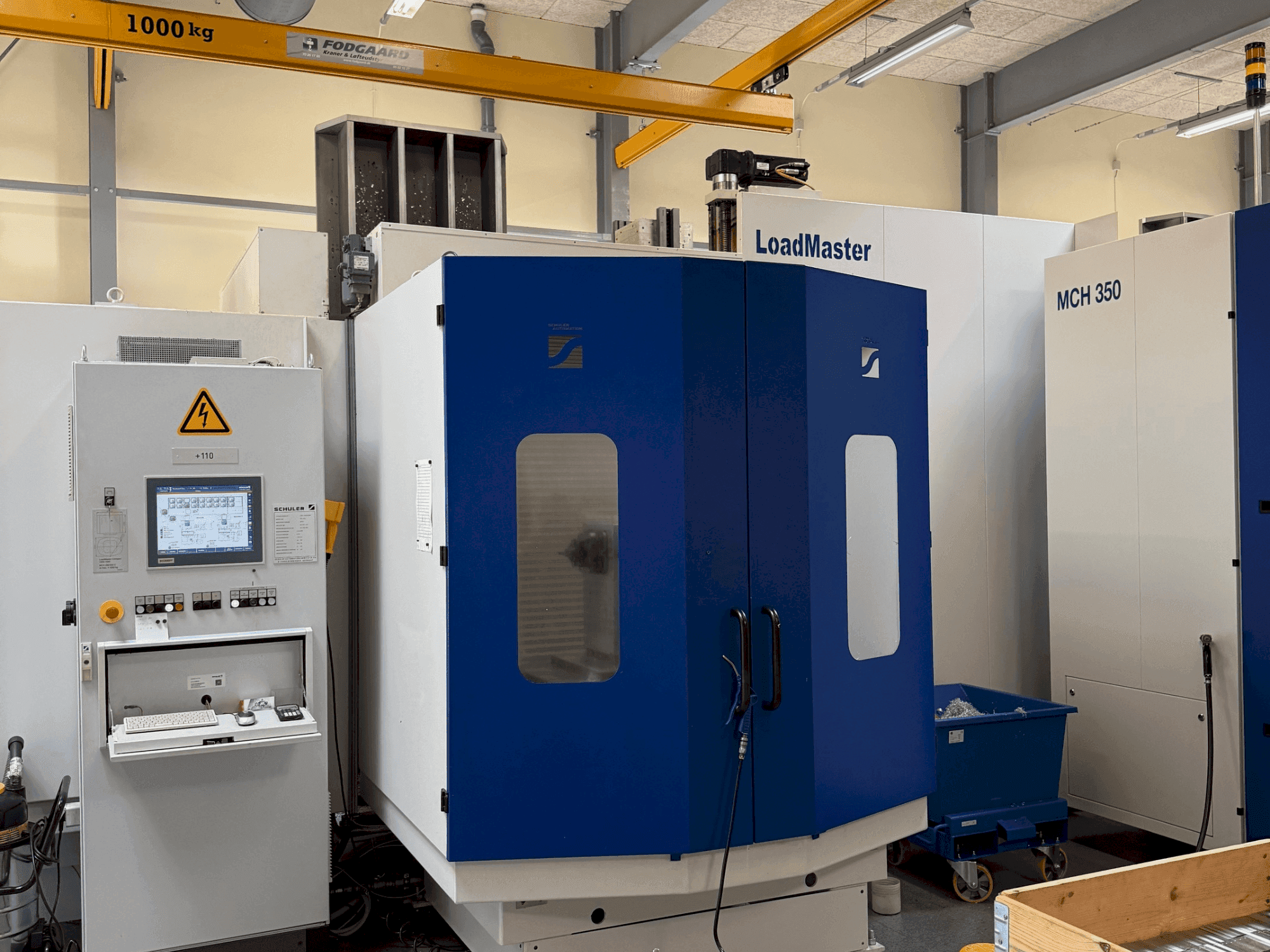 Prikaz stroja HELLER MCH 300 + MCH 300 C + 22 pallet system sprijeda