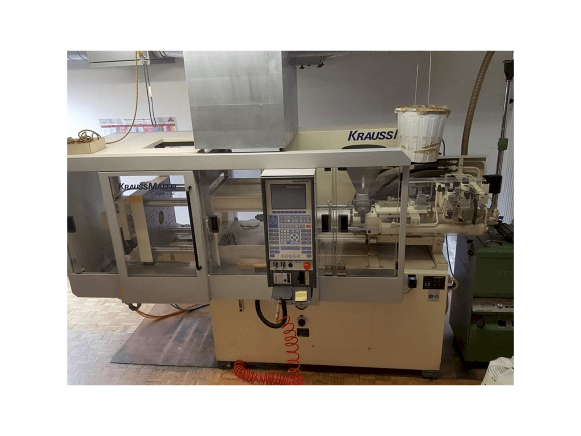 Prikaz stroja Krauss Maffei 40-125 C Winner sprijeda