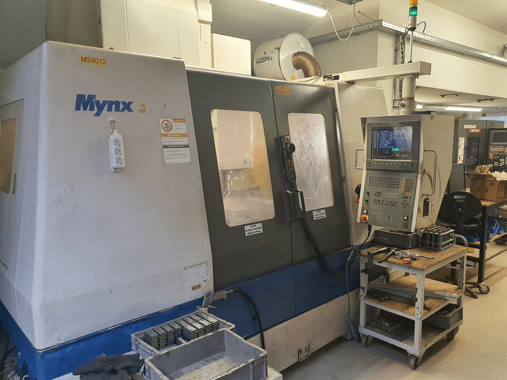 Prikaz stroja DAEWOO Mynx 50 sprijeda